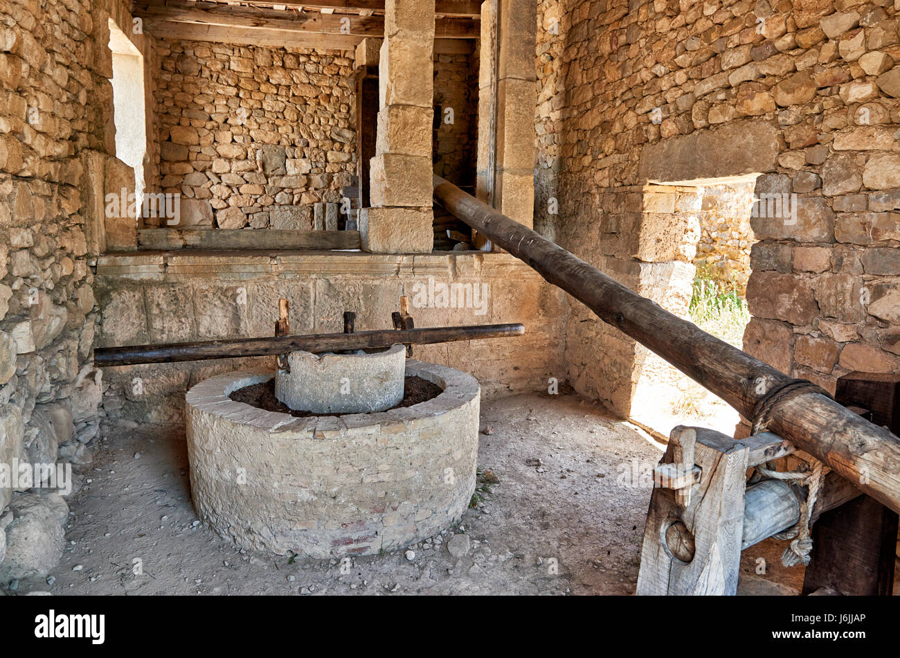 rekonstruierten römischen Olive press, römische Ausgrabungen in Volubilis, Marokko, Afrika Stockfoto