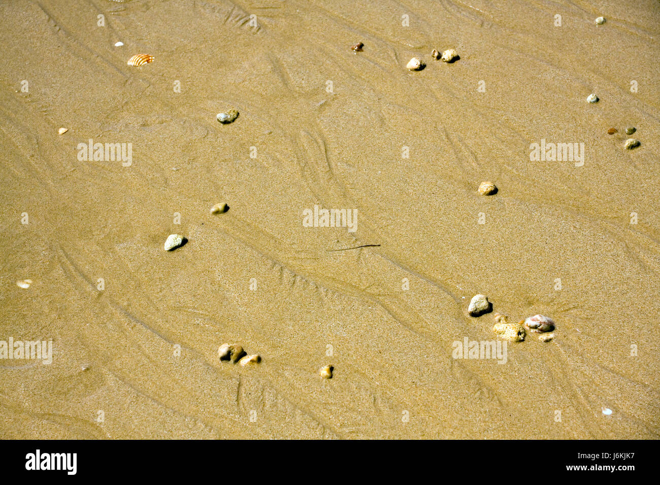 Sandstrand-Hintergrund Stockfoto
