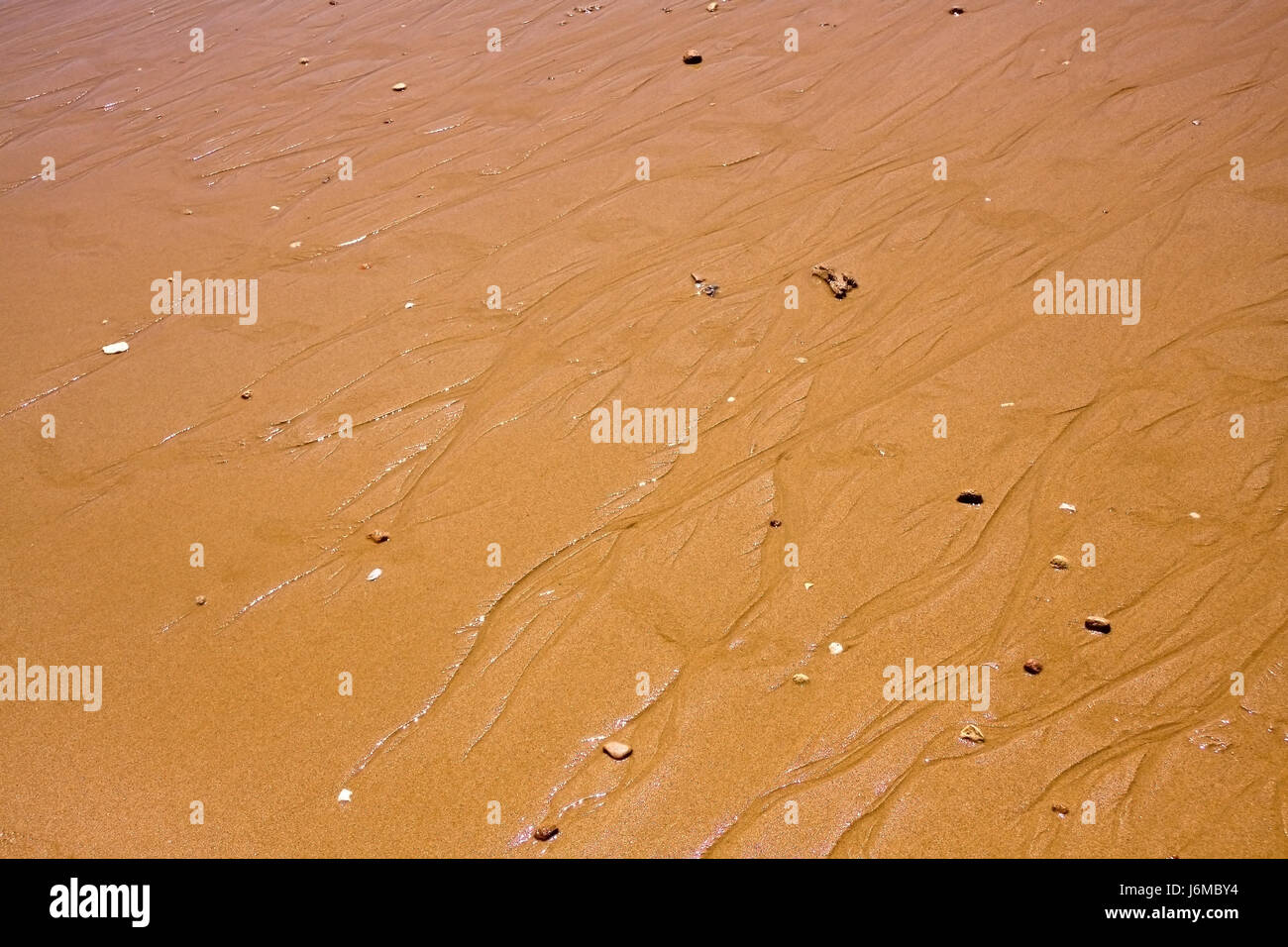 Sandstrand-Hintergrund Stockfoto