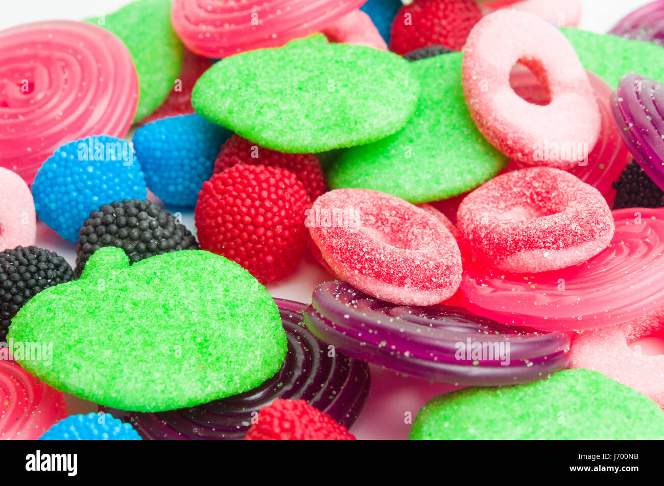 Viele verschiedene bunte Bonbons Stockfoto