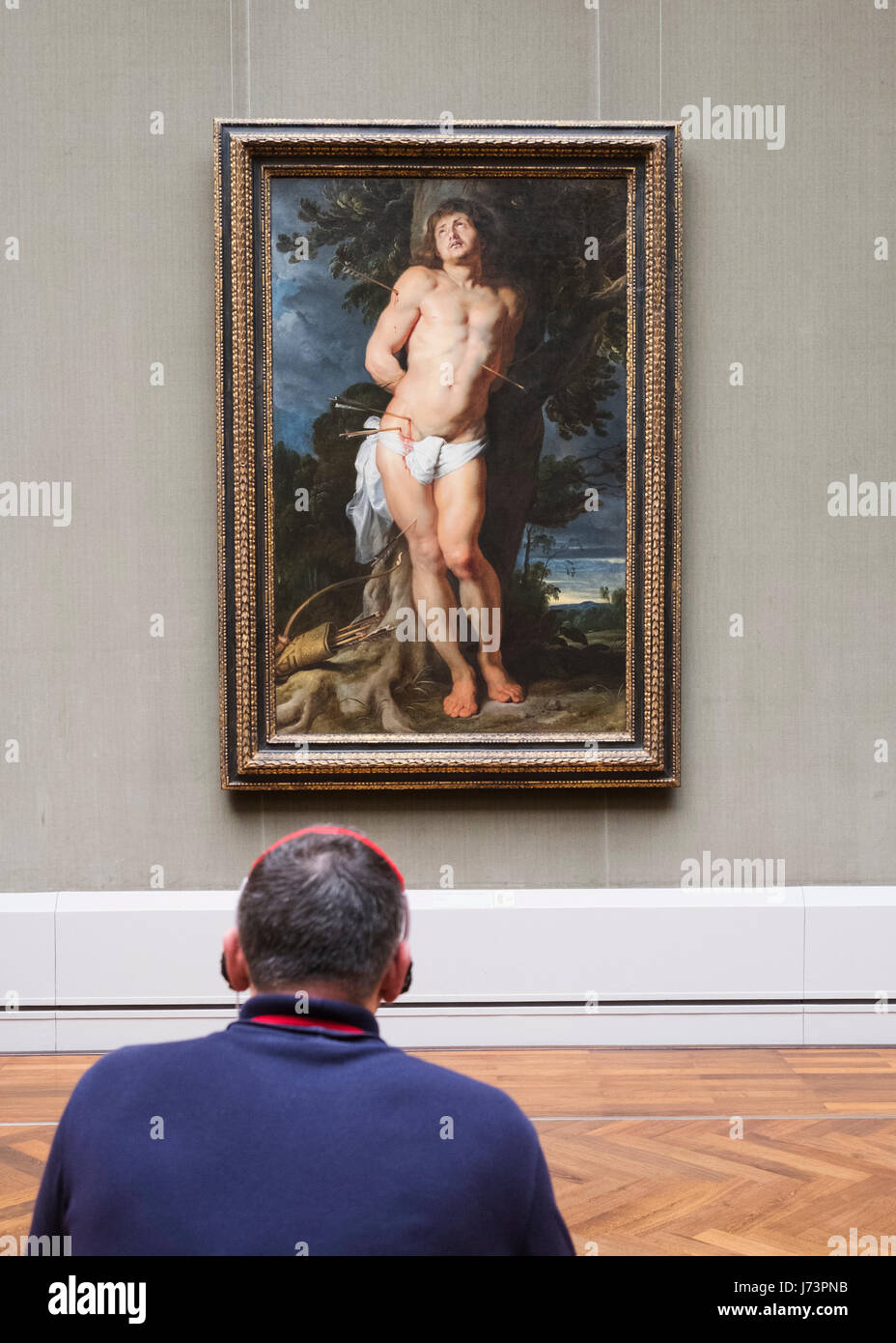 Menschen betrachten Gemälde von Peter Paul Reubens, Der hl Sebastian am Gemäldegalerie in Berlin, Deutschland Stockfoto