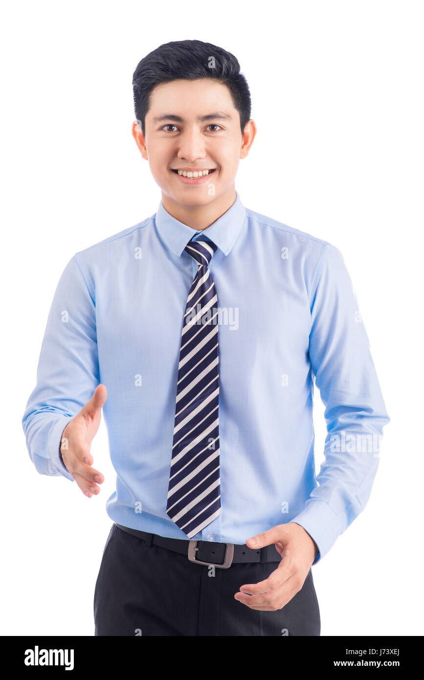 Glücklicher lächelnder junger asiatischen Mann zeigen Daumen isoliert auf weißem Hintergrund. Stockfoto