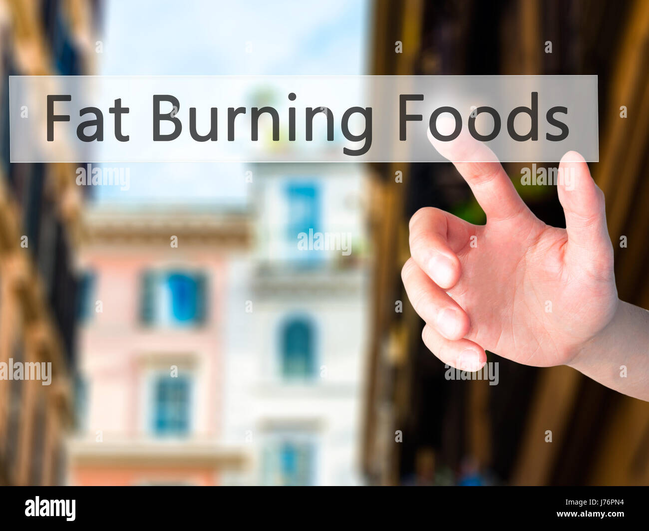 Fat Burning Foods - Hand drücken einer Taste auf unscharfen Hintergrund Konzept. Wirtschaft, Technologie, Internet-Konzept. Stock Foto Stockfoto