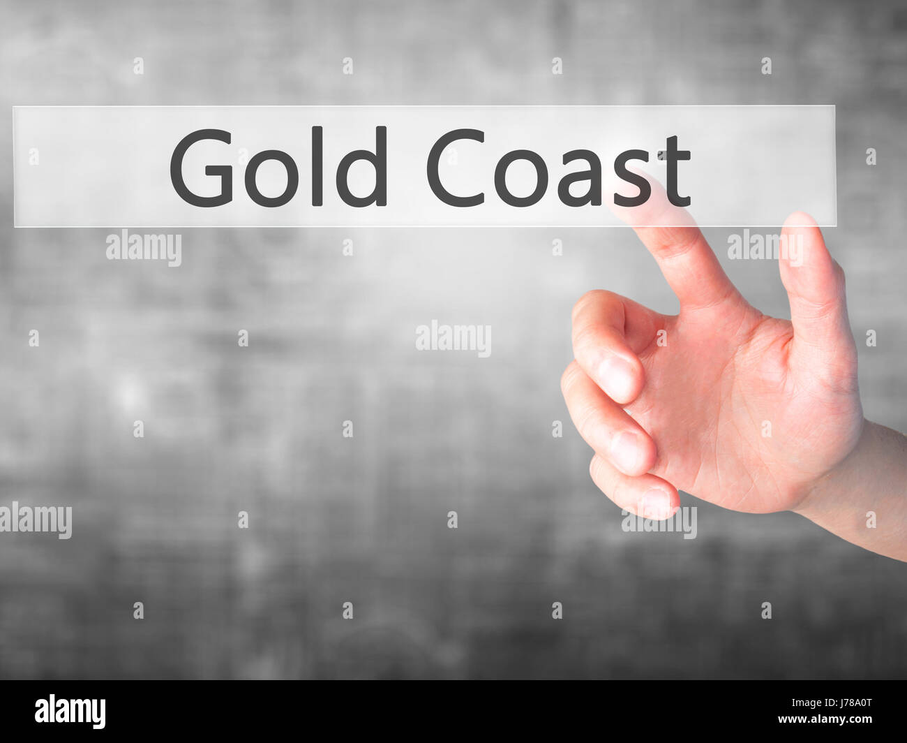 Gold Coast - Hand drücken einer Taste auf unscharfen Hintergrund Konzept. Wirtschaft, Technologie, Internet-Konzept. Stock Foto Stockfoto