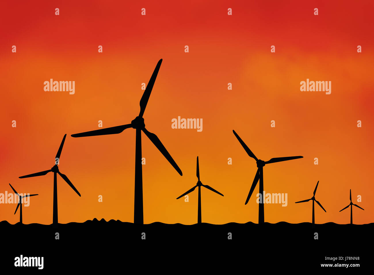 Viele Windmühlen als Silhouette mit orangefarbenen Himmel Sonnenuntergang Stockfoto