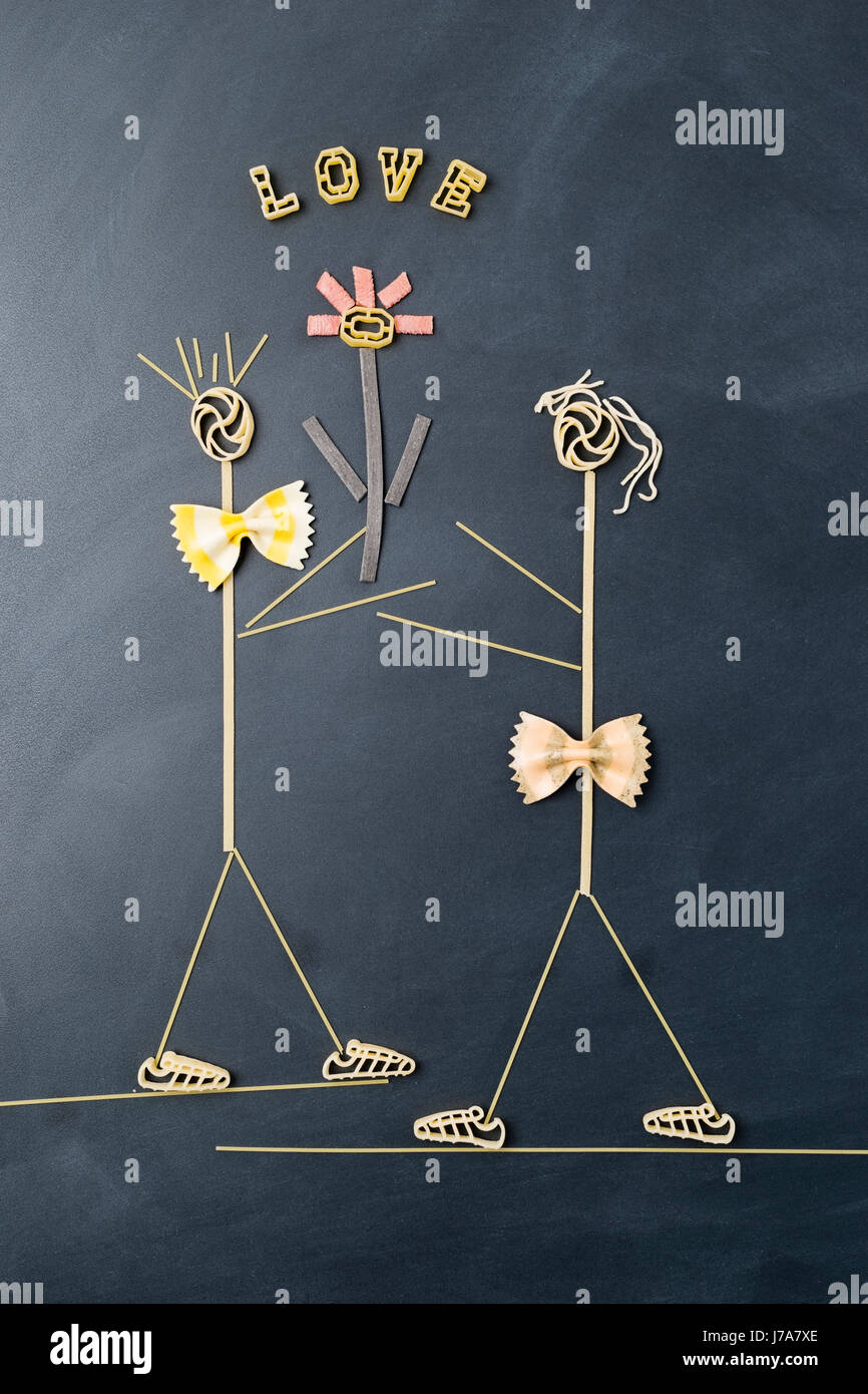 Pasta-Bild mit männlichen und weiblichen Gestalt in der Liebe Stockfoto