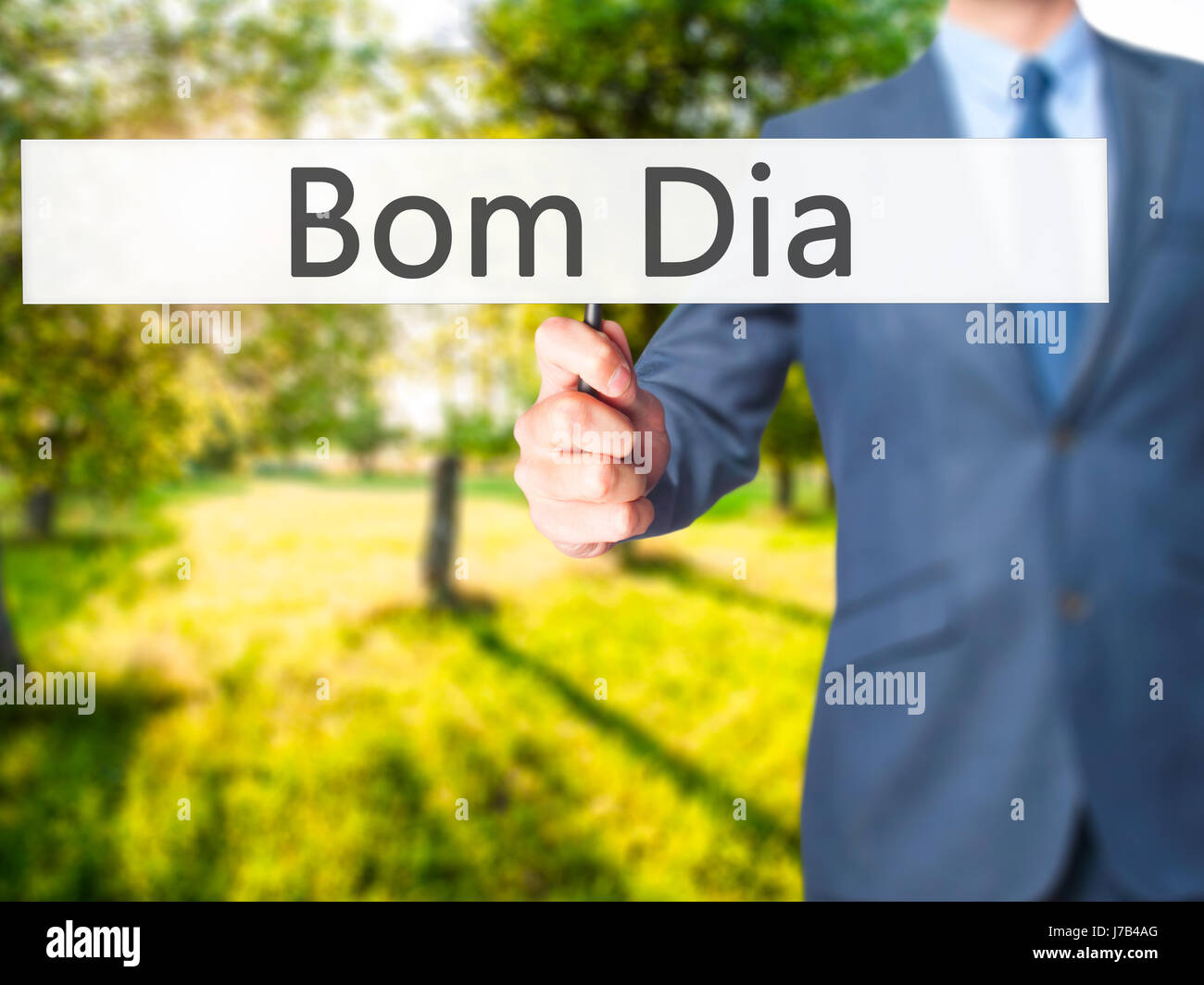 Bom Dia (In Portugiesisch - guten Morgen) - Geschäftsmann Hand mit Schild.  Wirtschaft, Technologie, Internet-Konzept. Stock Foto Stockfotografie -  Alamy