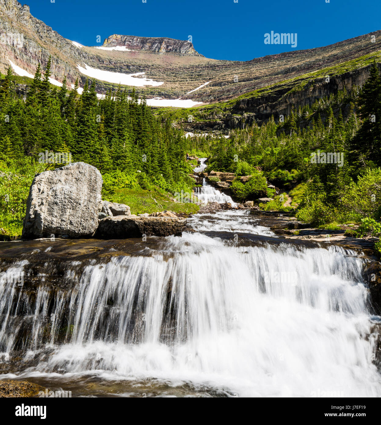Mittagessen-Creek-Glacier-Nationalpark / Vista/Continental divide/Berge/Wasserfall Stockfoto