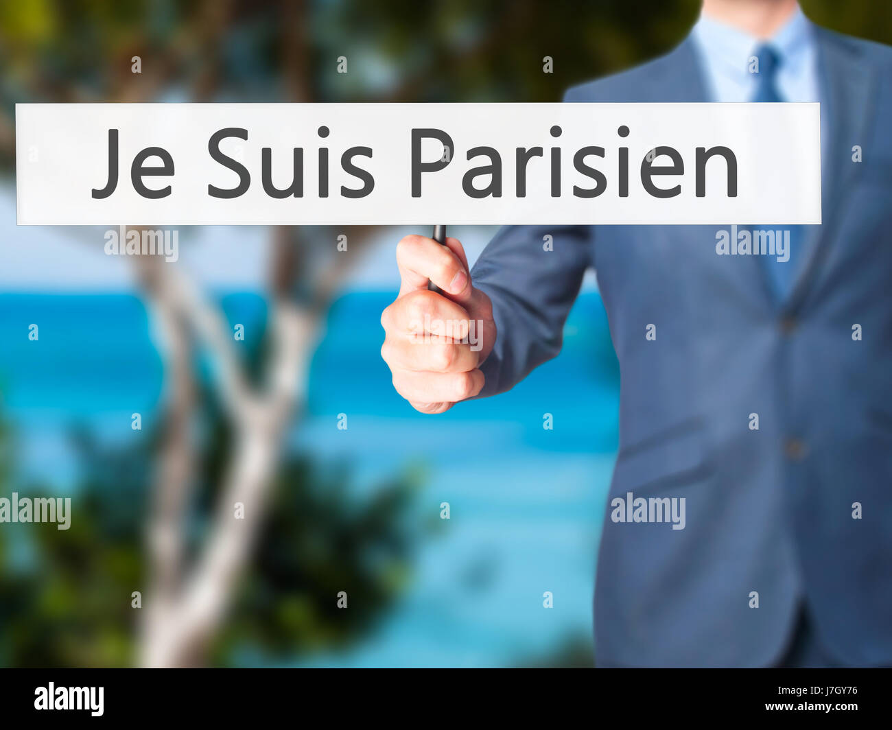 Je Suis Parisien (ich bin Parisien) - Geschäftsmann Hand mit Schild. Wirtschaft, Technologie, Internet-Konzept. Stock Foto Stockfoto
