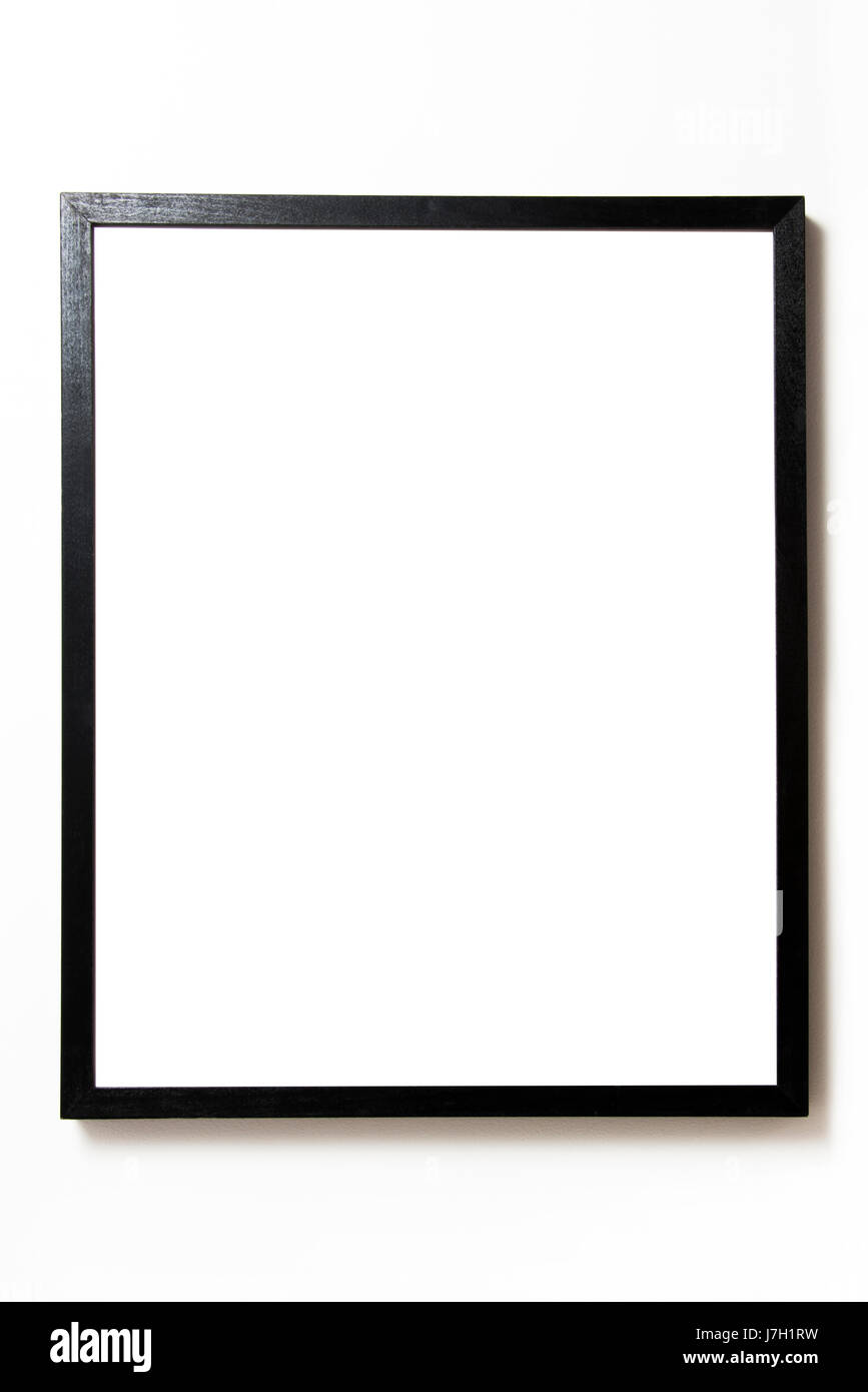 Leeren rechteckigen schwarzen Rahmen auf einer weißen Wand hängen Stockfoto