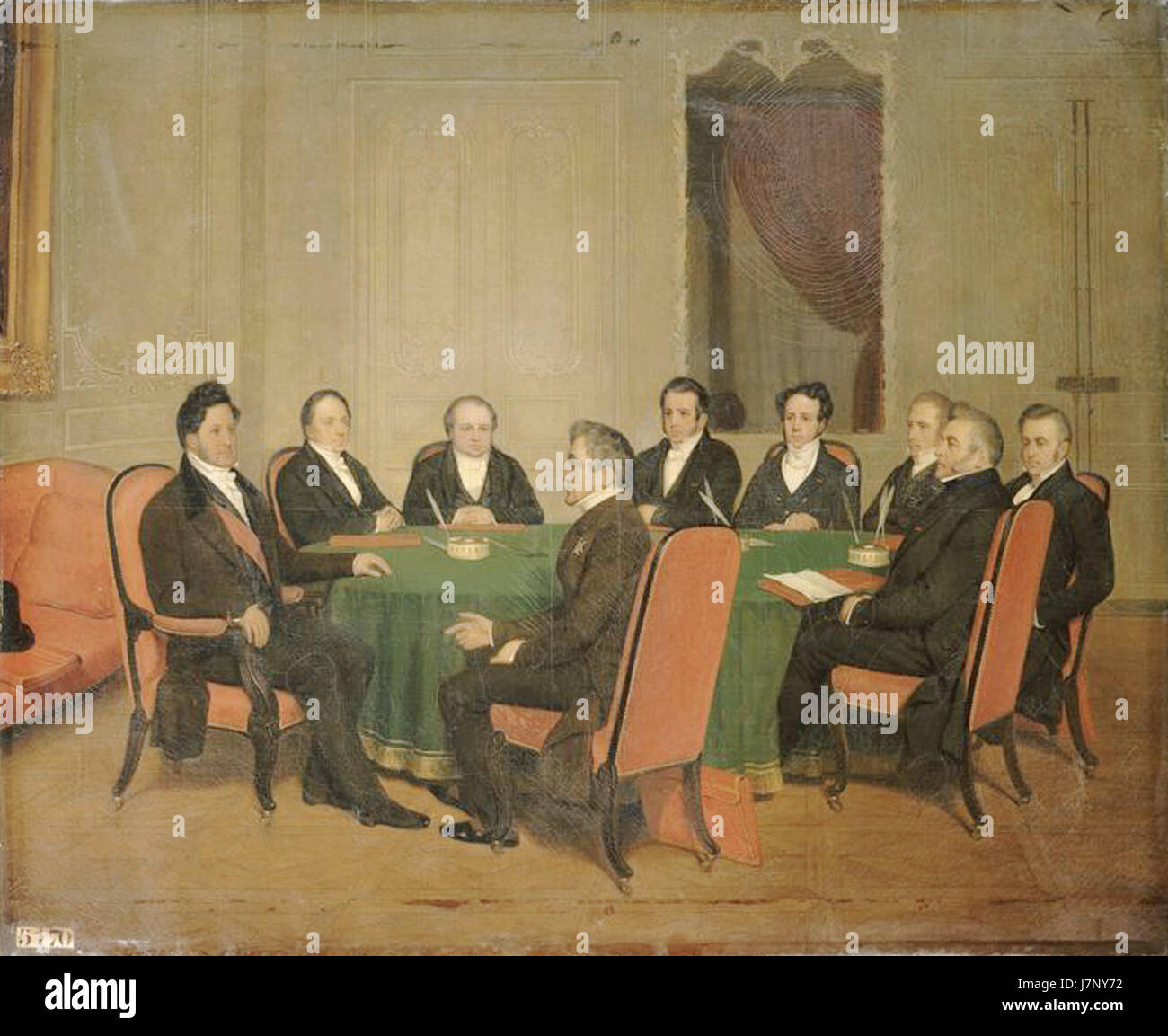 Das Gemälde „Conseil des ministres“ von Scheffer aus dem Jahr 1838 zeigt eine Szene aus einer französischen Kabinettssitzung, die die politische Atmosphäre des Frankreich des 19. Jahrhunderts einnimmt. Stockfoto