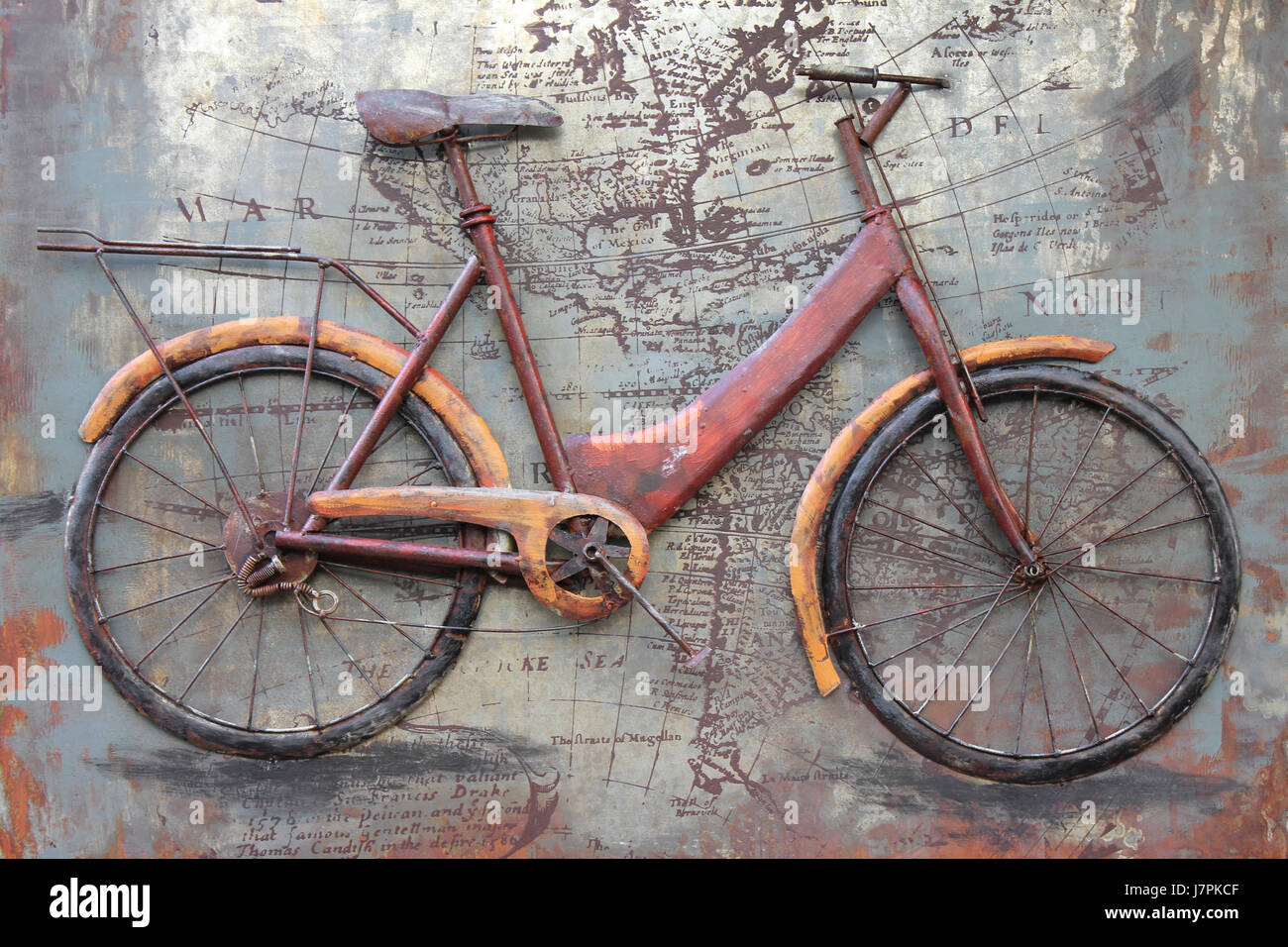 Moderne Kunstwerke Fahrrad auf Weltkarte Stockfoto