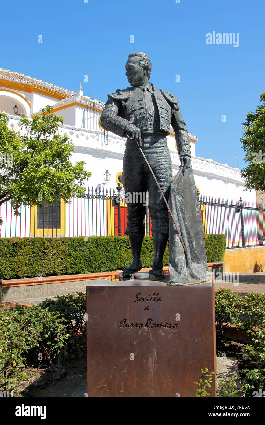 Denkmal-Statue Andalusien Sevilla blau Denkmal Baum Grün Statue braun Stockfoto