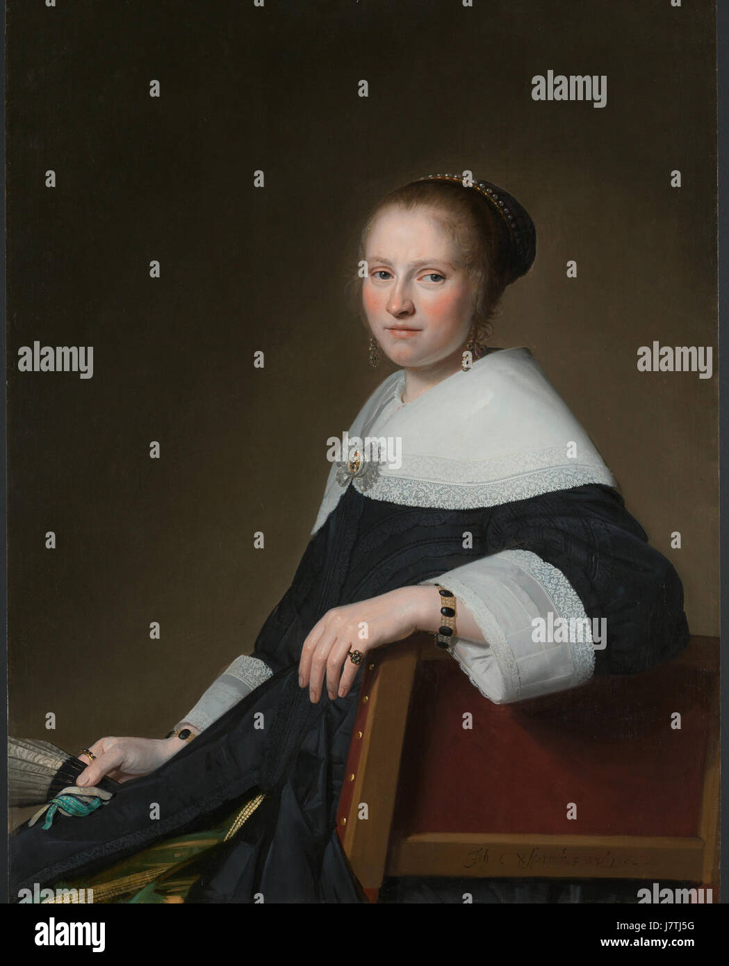Dieses Porträt im Rijksmuseum zeigt Maria van Strijp, eine historische Figur aus den Niederlanden. Das Kunstwerk stellt niederländische Porträts aus dem 17. Jahrhundert dar und dient als Schlüsselbeispiel für den künstlerischen Stil der Epoche. Stockfoto Dieses Porträt im Rijksmuseum zeigt Maria van Strijp, eine historische Figur aus den Niederlanden. Das Kunstwerk stellt niederländische Porträts aus dem 17. Jahrhundert dar und dient als Schlüsselbeispiel für den künstlerischen Stil der Epoche. Stockfoto