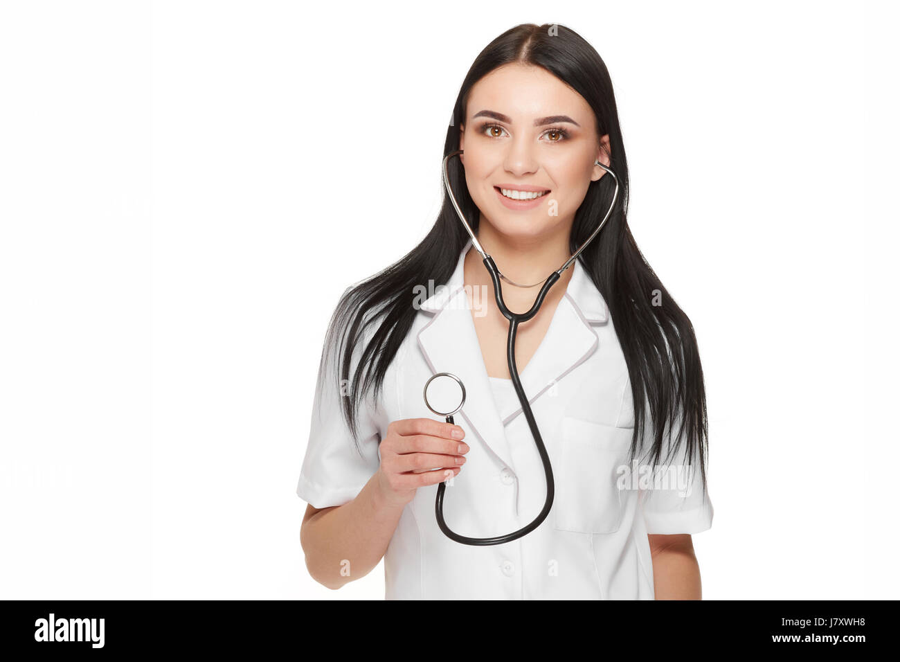 Ärztin mit Stethoskop in die Kamera Lächeln. Stockfoto