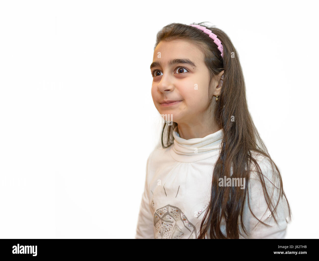 Porträt der jungen Mädchen mit einer Grimasse des Staunens Stockfoto
