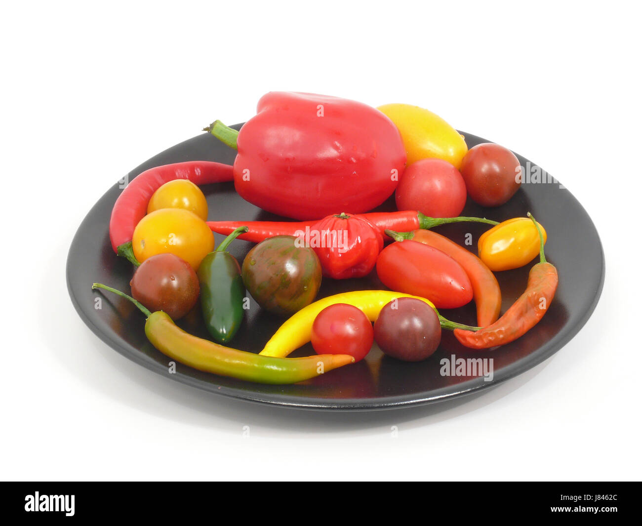 Tomaten und Paprika onen Stockfoto