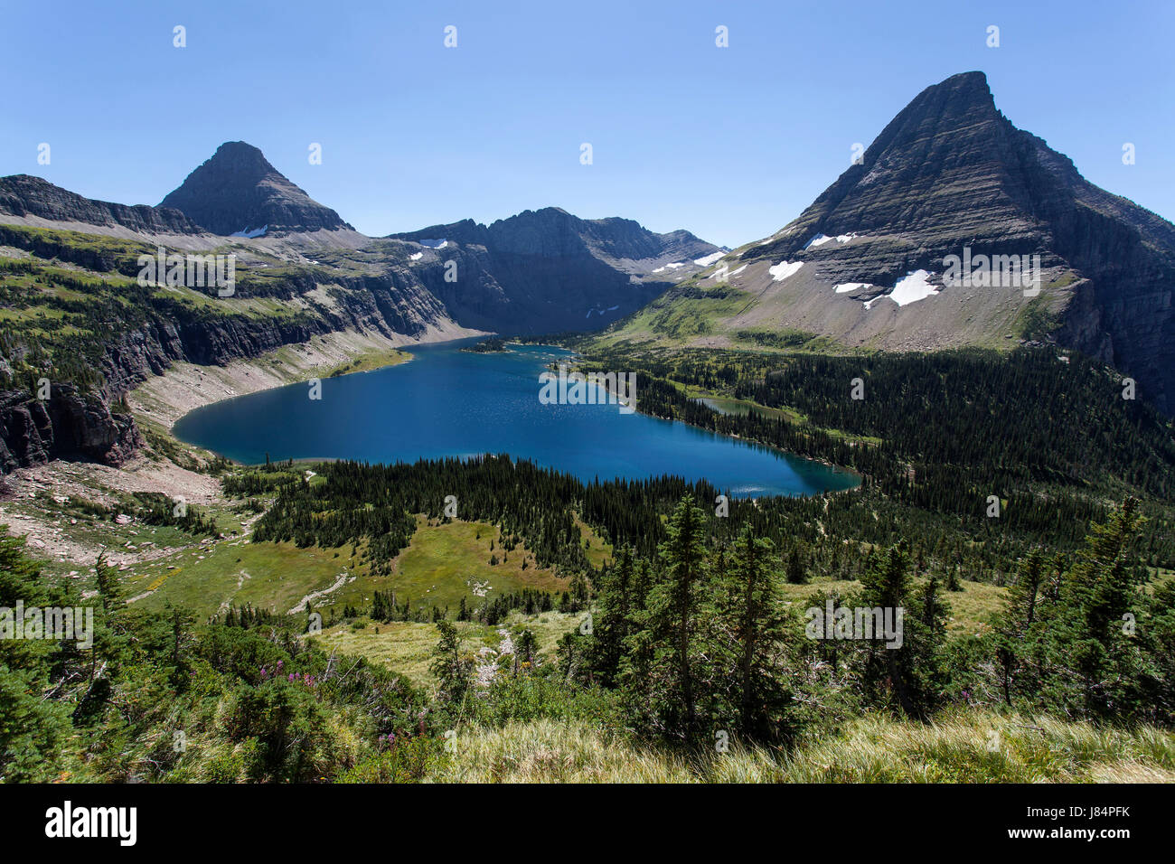 Versteckten See mit Reynolds Bergen und Bearhat, Glacier Nationalpark, Rocky Mountains, Montana, USA Stockfoto