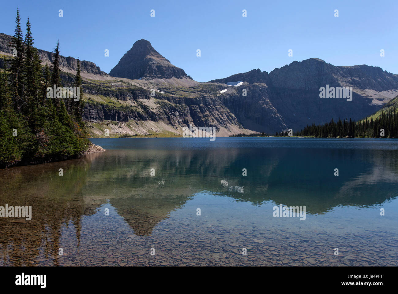 Versteckten See mit Reynolds Berg, Glacier Nationalpark, Rocky Mountains, Montana, USA Stockfoto