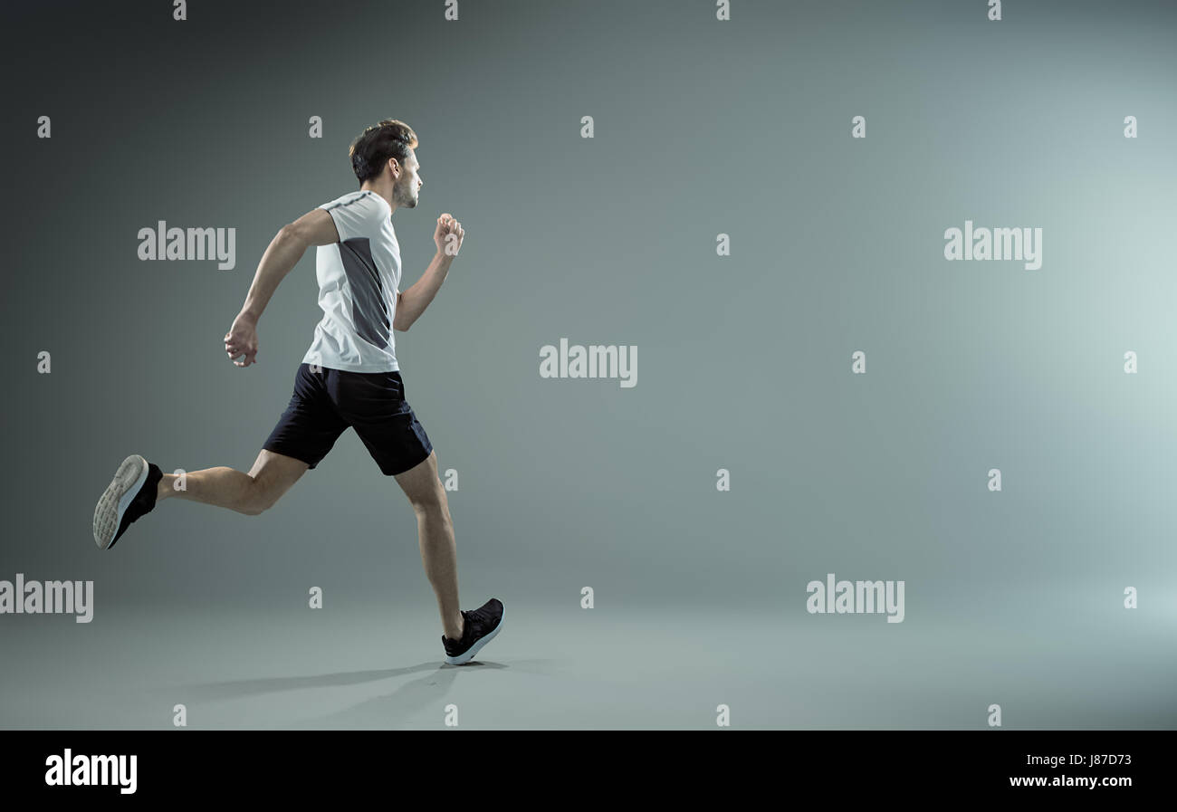 Jungen männliche Athlet - isoliert ausgeführt Stockfoto