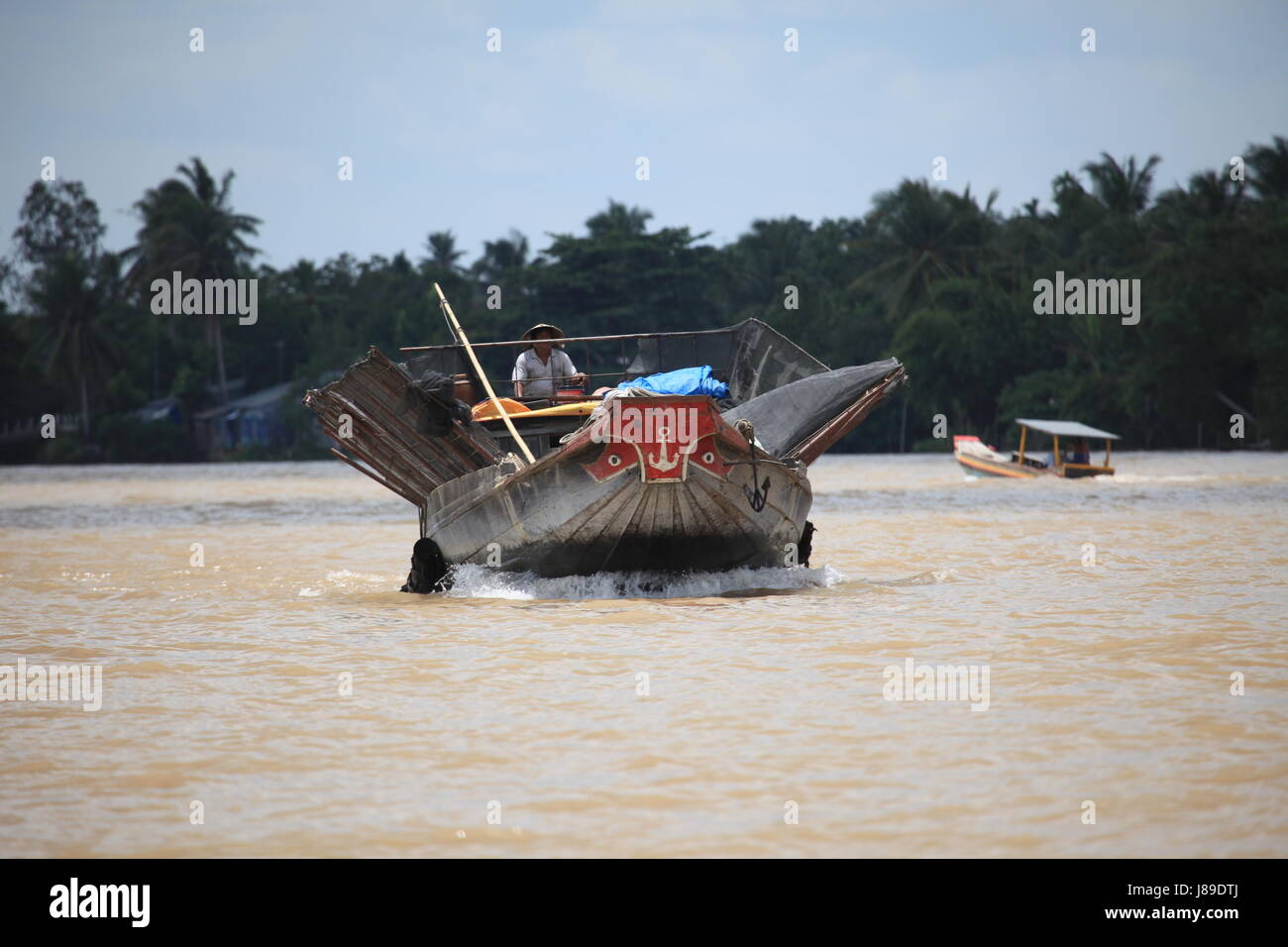 alte Fischer auf dem mekong Stockfoto