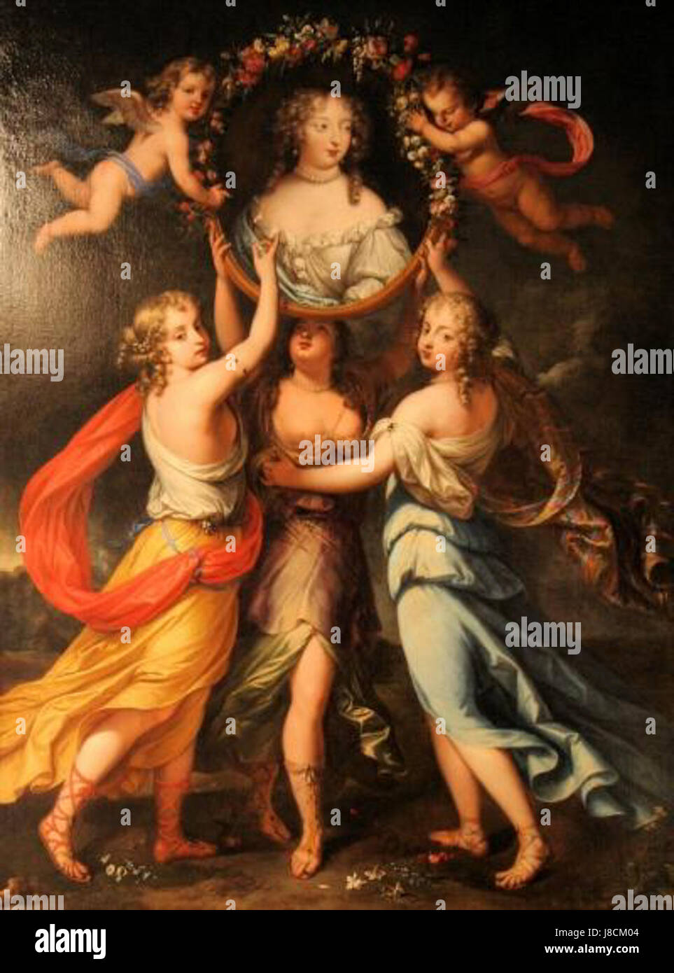 Das Gemälde Madame de Montespan Held by the Three Graces wird dem französischen Künstler Nicolas Mignard zugeschrieben. Es zeigt die prominente französische Adlige Madame de Montespan, umgeben von symbolischen Figuren der drei Grazen, die Charme, Schönheit und Eleganz in der französischen Barockkunst repräsentieren. Stockfoto