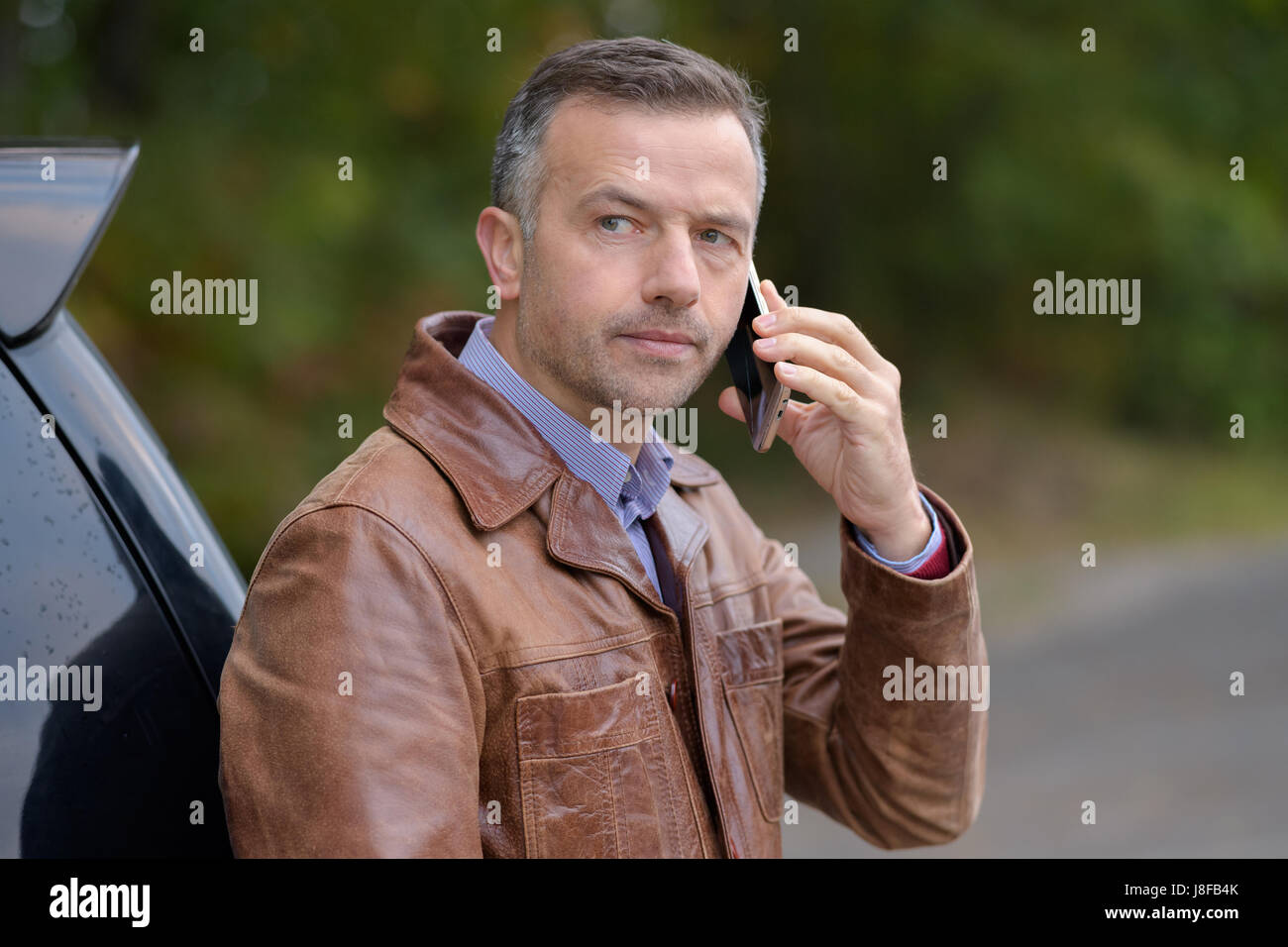 Ausspionieren von jemand Stockfoto