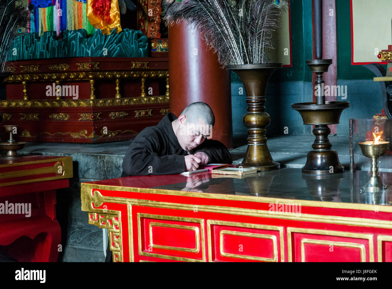 Mönch schreiben, Lama-Tempel, buddhistische Tempel und Kloster, Chaoyang District, Beijing, China Stockfoto