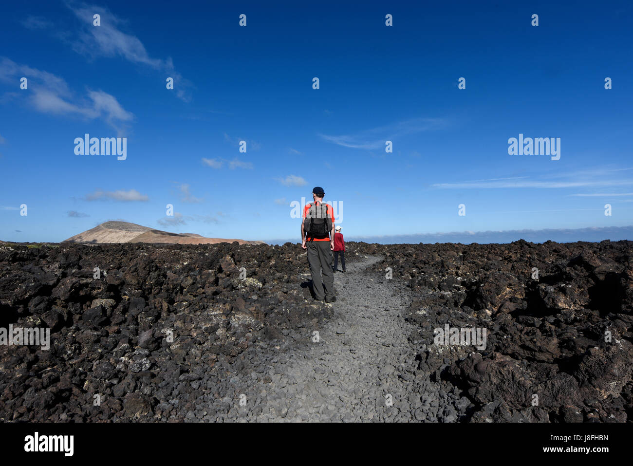 Wandern mit Kindern auf den Kanarischen Inseln - Vulkanlandschaft der Nationalpark Timanfaya, Lanzarote, Kanarische Inseln, Spanien Stockfoto