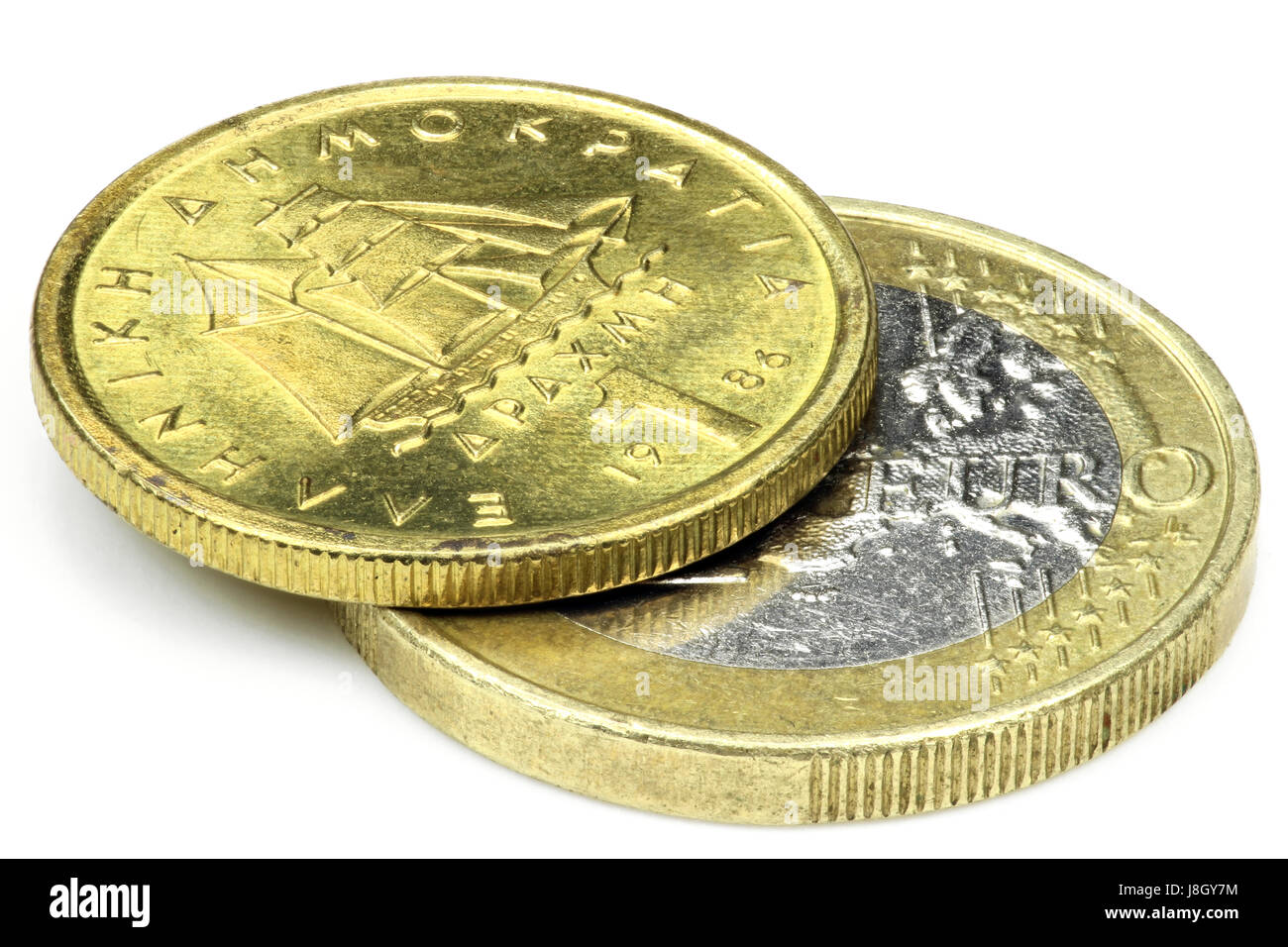 1 Europäische Euro und 1 griechische Drachme isoliert auf weißem Hintergrund Stockfoto