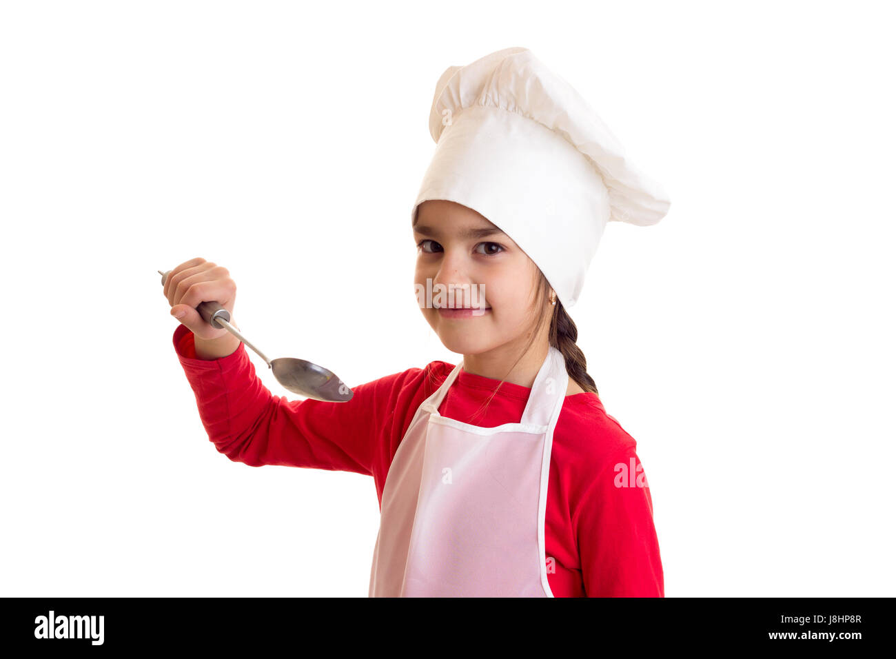 Kleines Mädchen Kochen Stockfoto