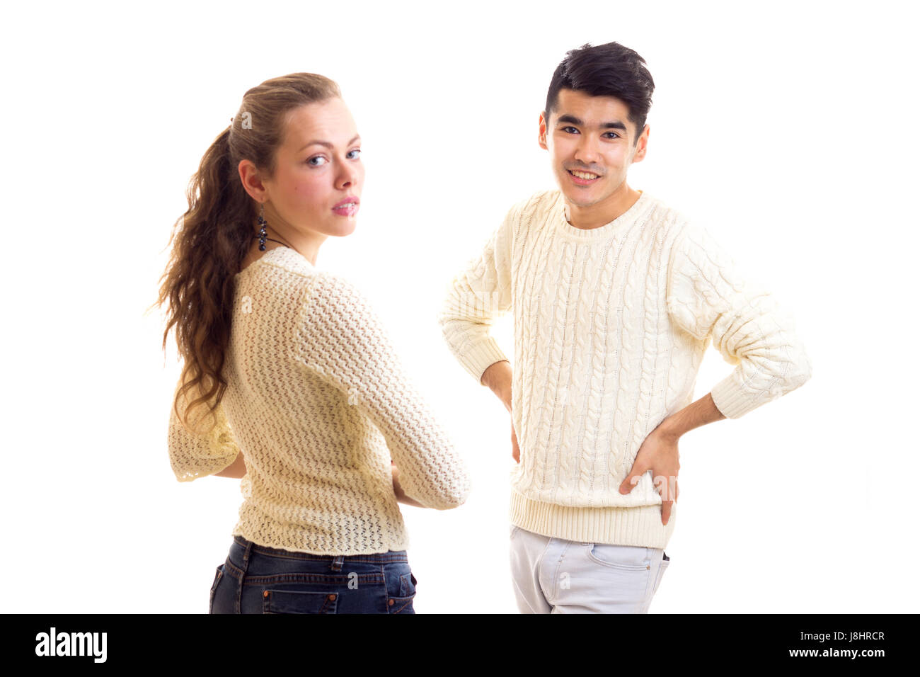 Junges Paar in weißen Pullover Stockfoto