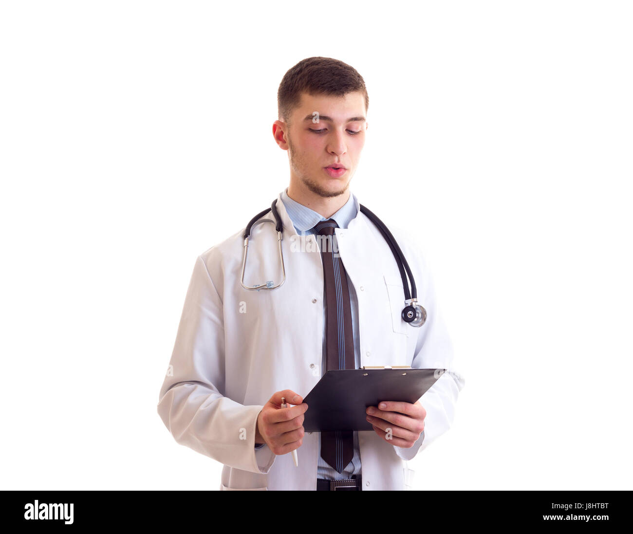 Junger Mann in Arzt-Kleid Stockfoto