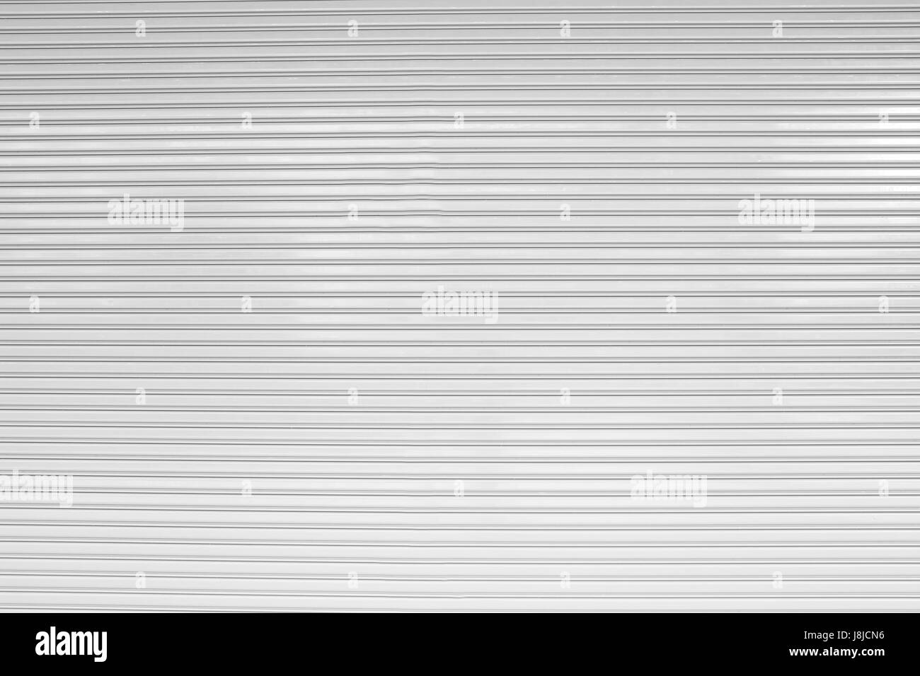 weiße Oberfläche Stahltür für Design Textur Kulisse im Hintergrund. Stockfoto