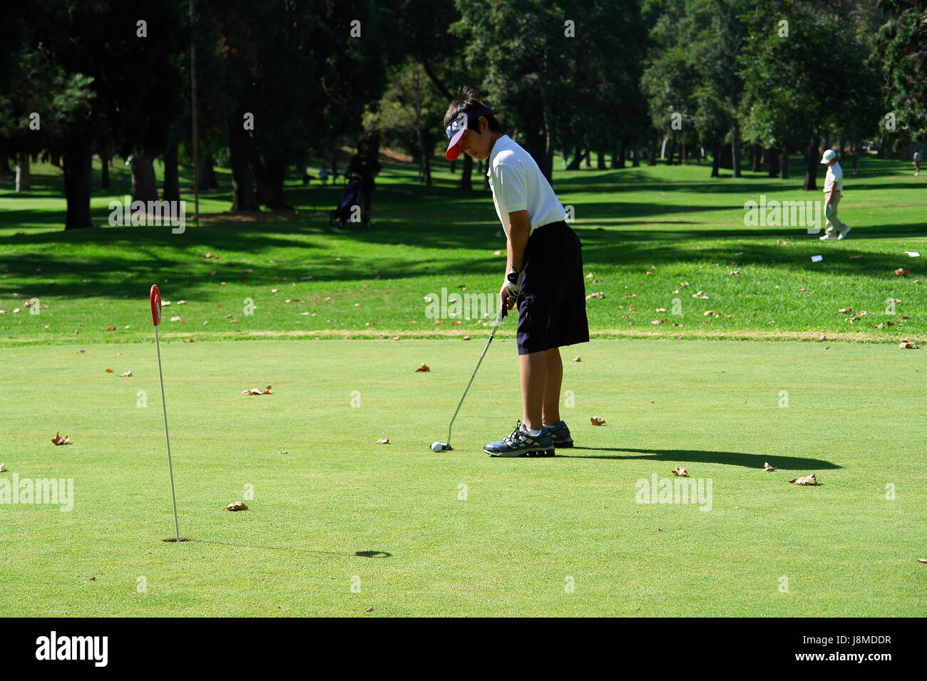 Golfer üben auf der driving-range Stockfoto