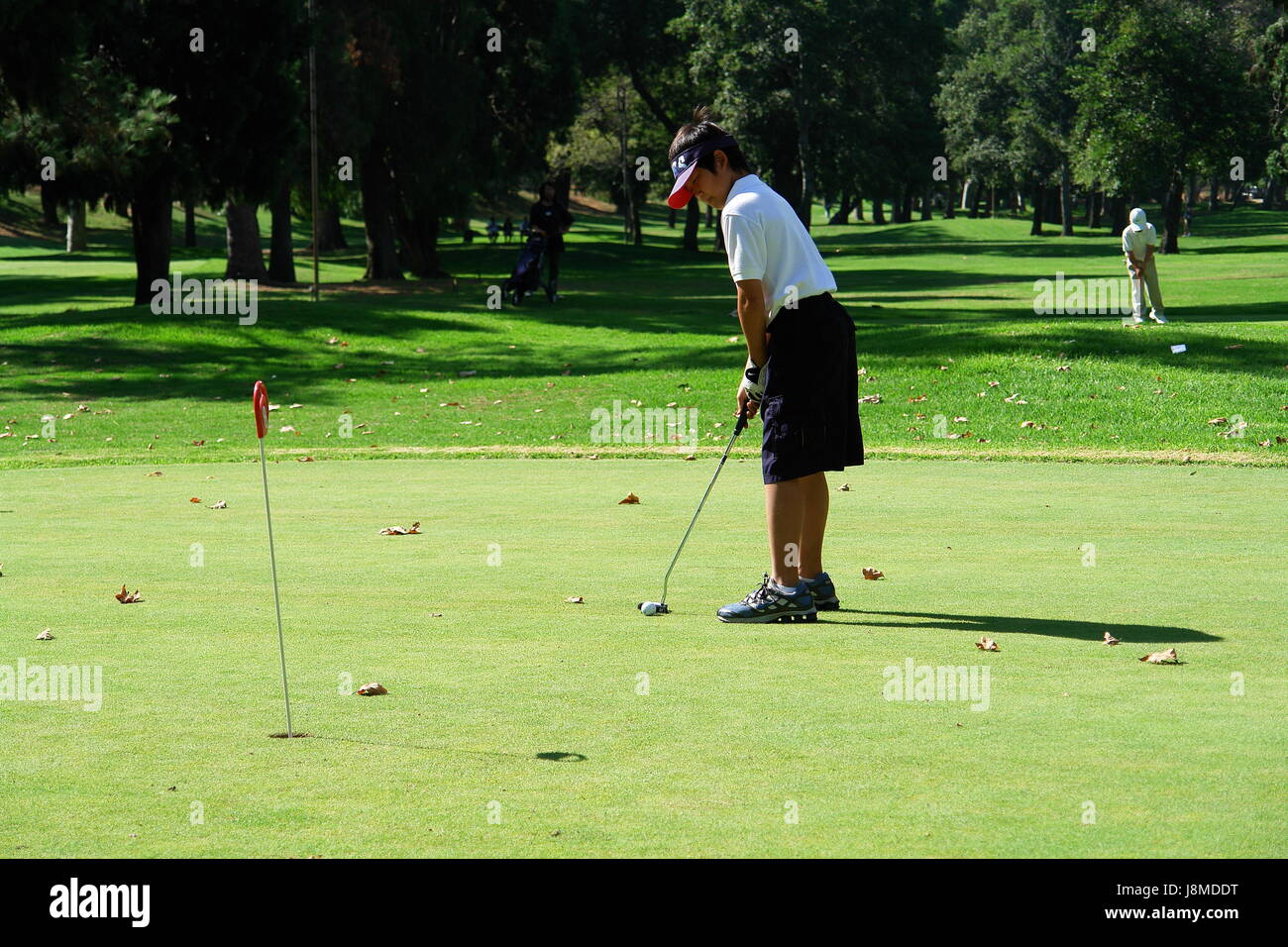 Golfer üben auf der driving-range Stockfoto