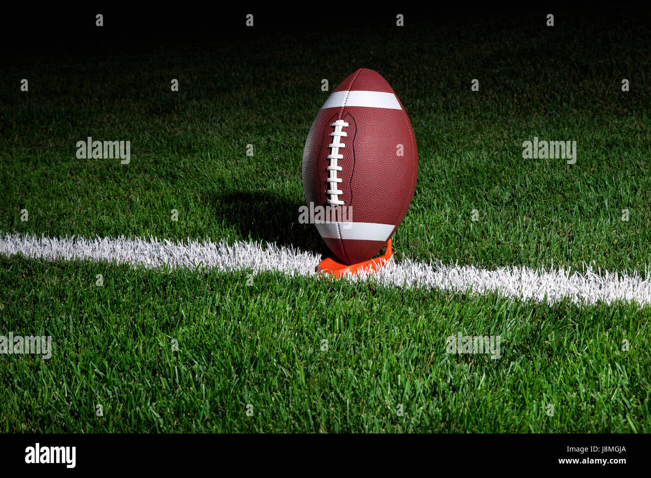 College-Football-Stil auf einem t-Shirt in der Nacht bereit für Kick-off Stockfoto