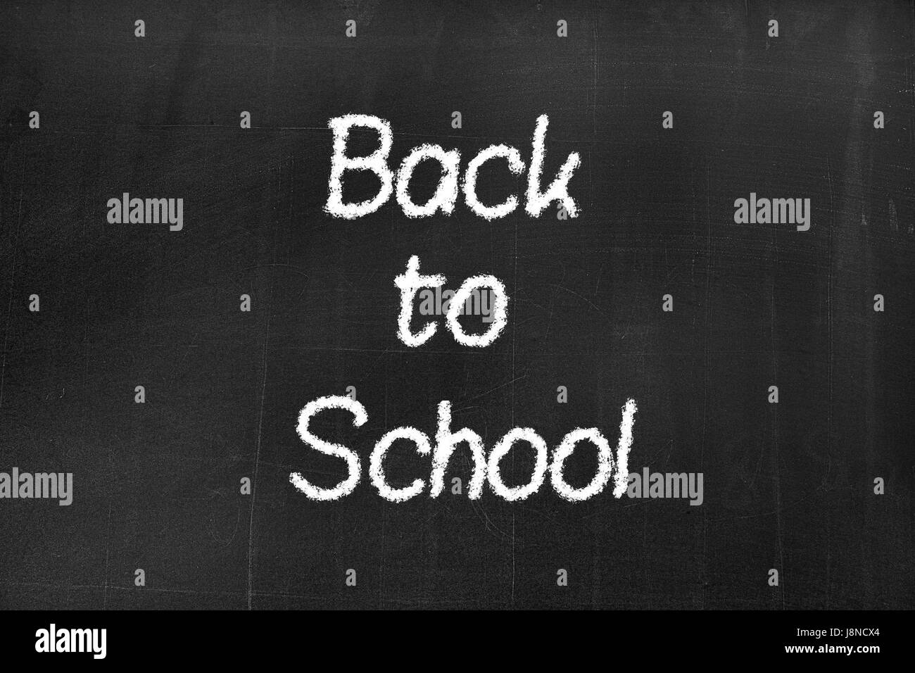 Tafel mit dem Text "Back to School" Hintergrundtextur Stockfoto