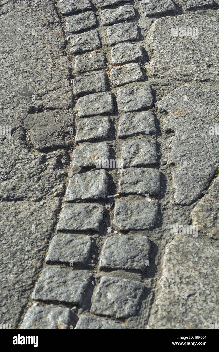 Abschnitt der Plasterung Granit Schustern in Truro, Cornwall. Stockfoto