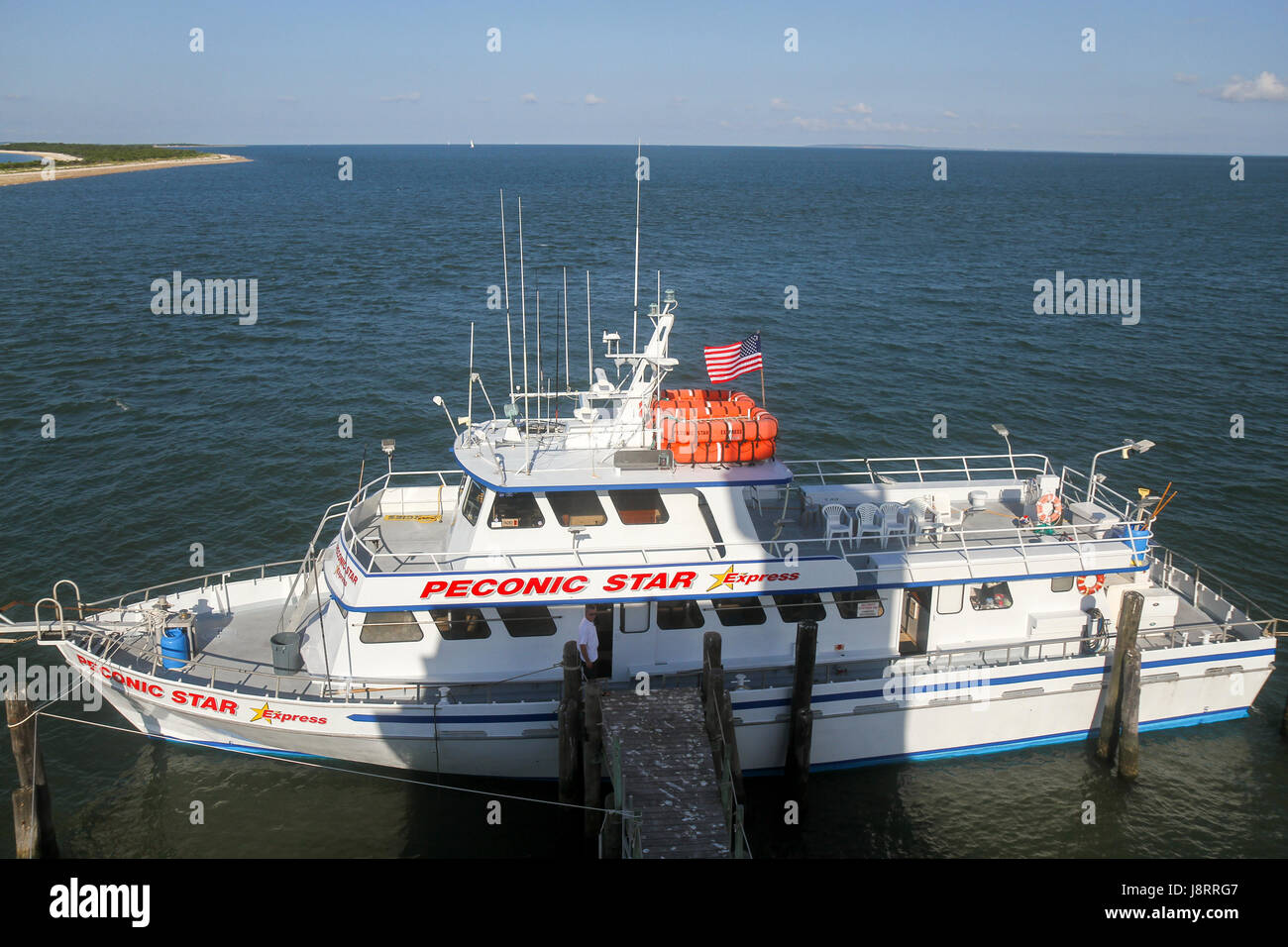 Die Peconic Star Express, die Passagiere aus dem East End Seaport Museum in Greenport Longbeach Bar Leuchtturm bringt. Long Island, New York. Stockfoto