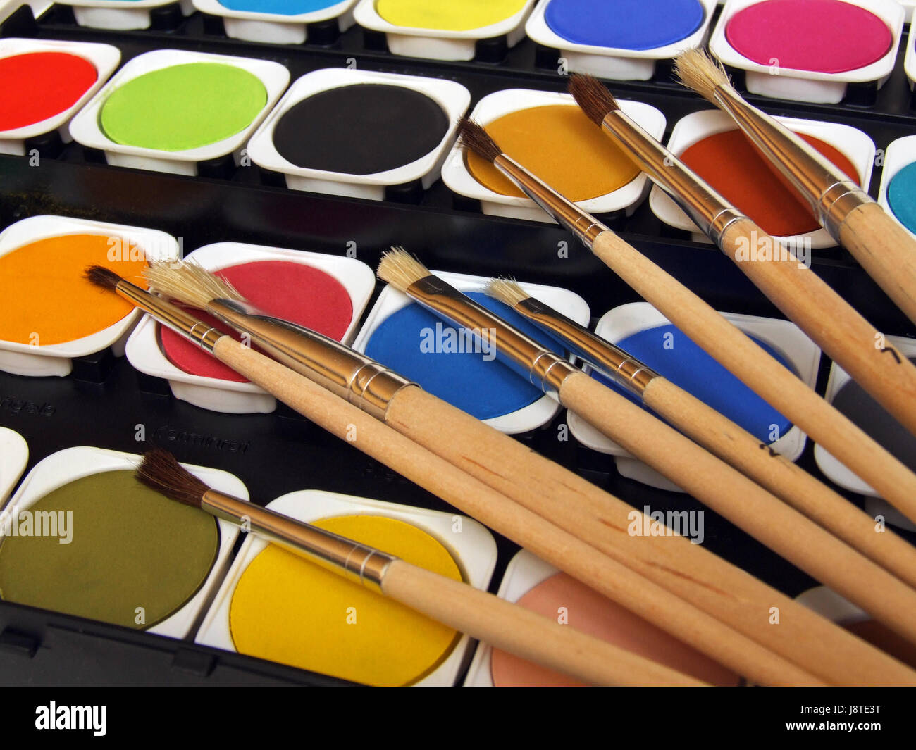 Farben und Pinsel Stockfoto