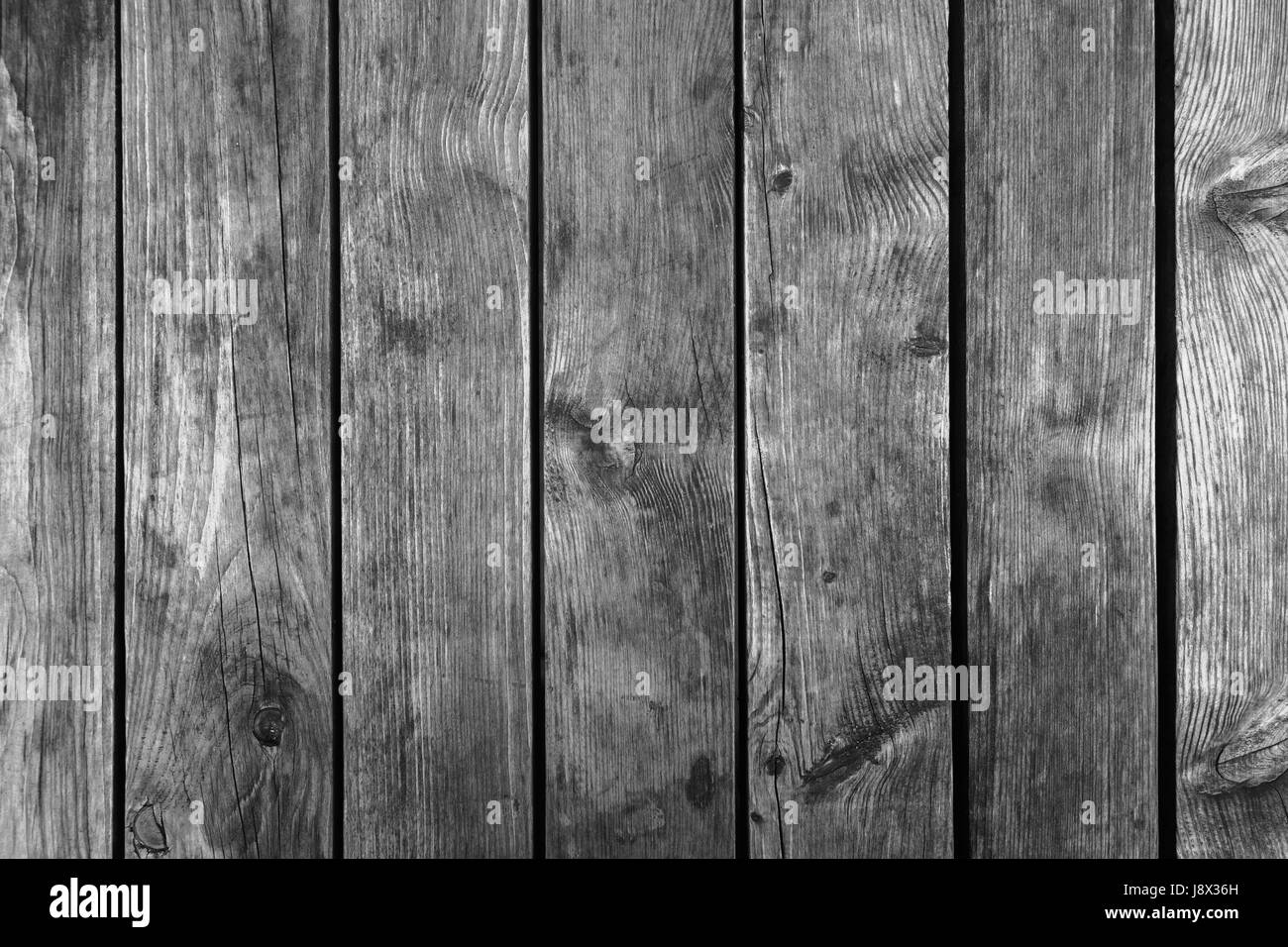 Alten dunkelgrau verwitterte Holzwand, flache Hintergrundtextur Foto Stockfoto