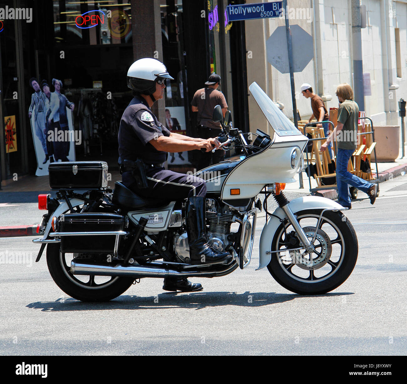 Los Angeles Polizei Department.LAPD.Police Mann Offizier auf dem Motorrad unterwegs in Hollywood, Los Angeles, Kalifornien, USA, Vereinigte Staaten von Amerika Stockfoto