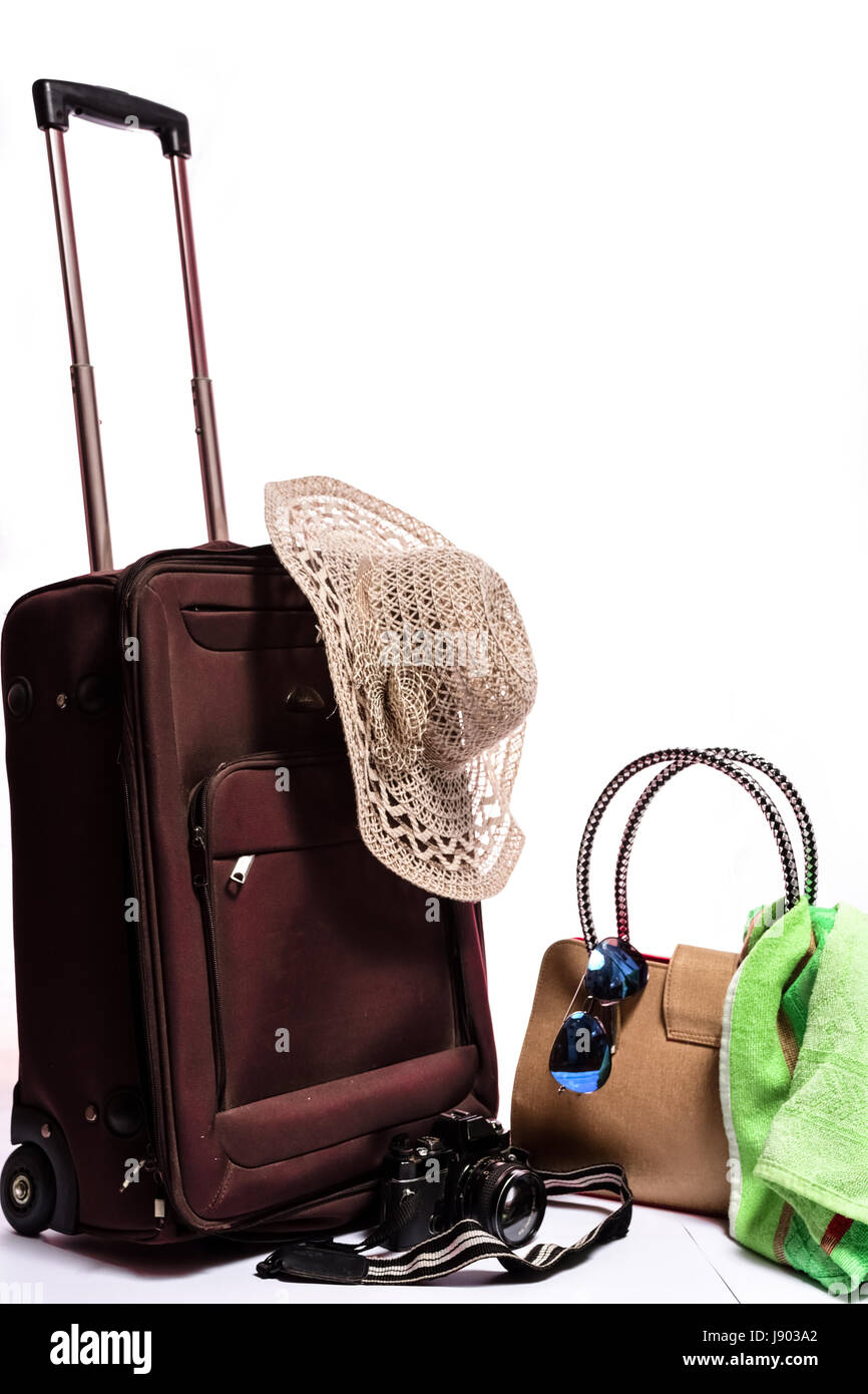 Reise-Accessoires auf weißem Hintergrund Stockfoto