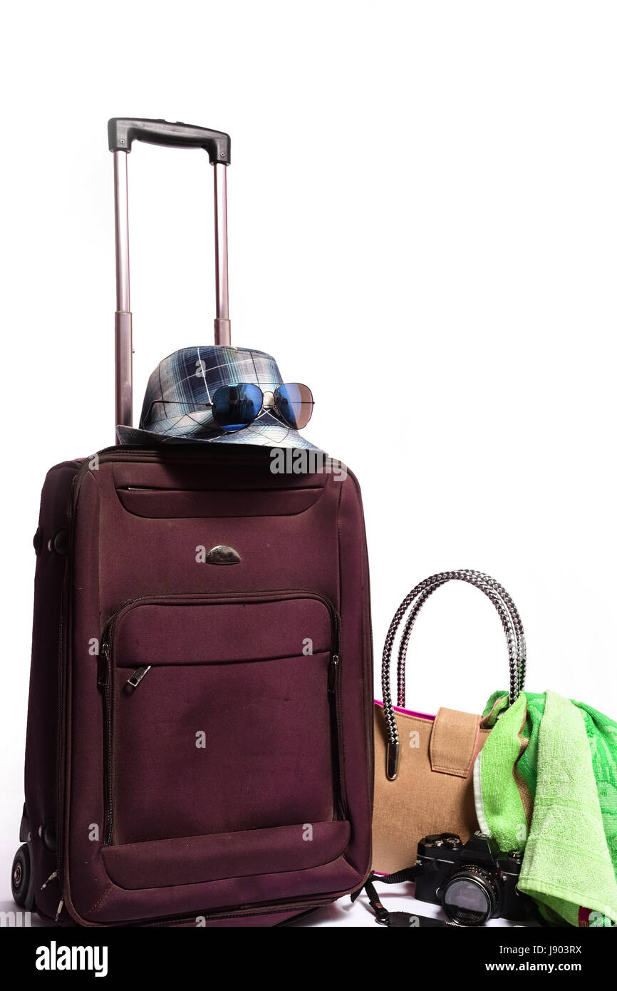 Reise-Accessoires auf weißem Hintergrund Stockfoto