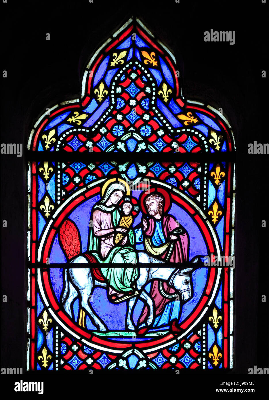 Nativity Fenster, Glasmalereien von Oudinot von Paris, 1861, Feltwell Kirche, Norfolk, Großbritannien, Mary Joseph und Jesuskind nach Ägypten fliehen Stockfoto