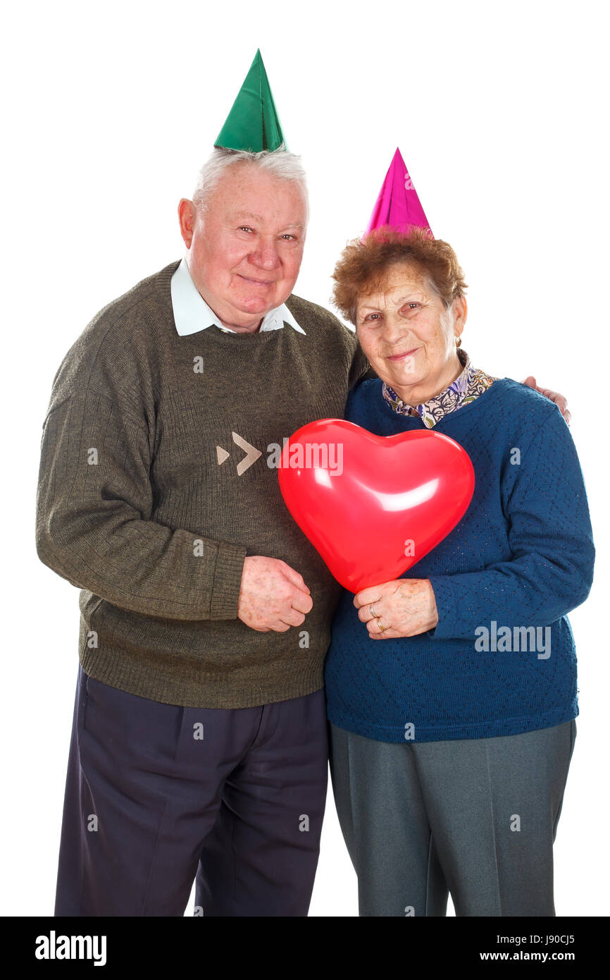 Porträt von einem älteren Ehepaar feiert Geburtstag - isolierte Hintergrund Stockfoto
