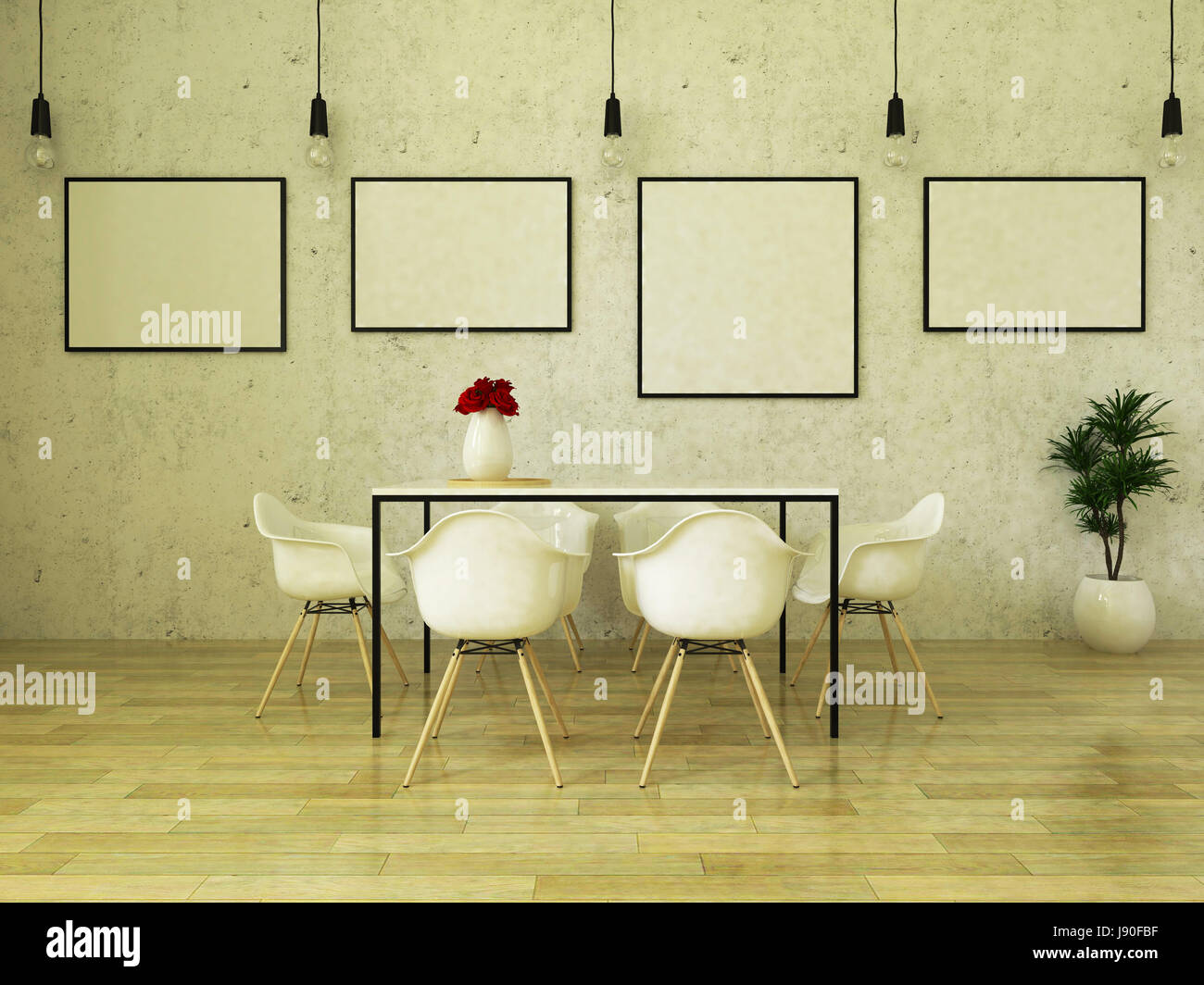 Schöner Esstisch mit weißen Stühlen auf Holzboden vor einer Betonwand mit Bilderrahmen und abgehängte Leuchten Stockfoto