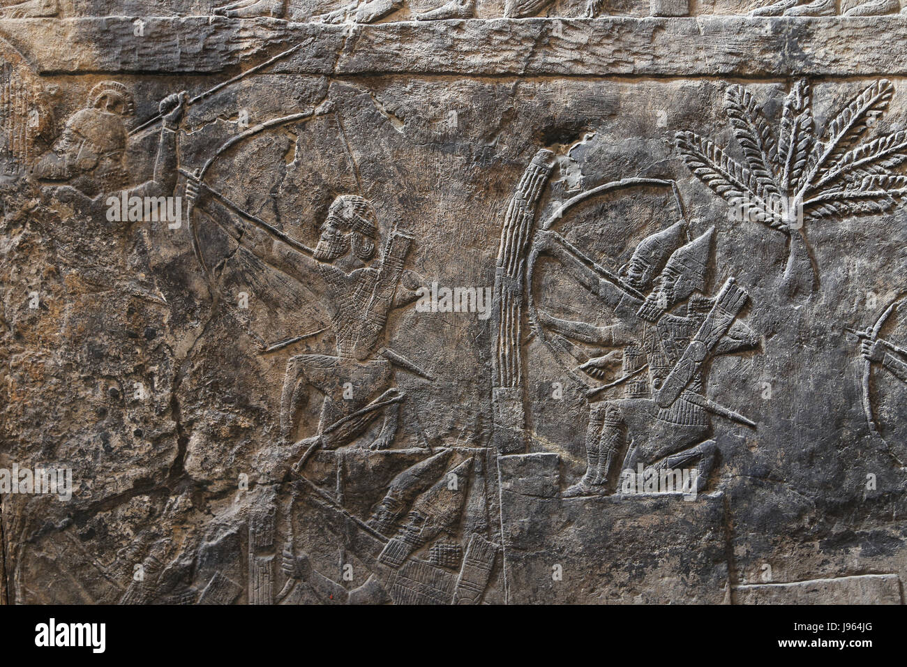 Angriff auf die Stadt - Alammu. Assyrische, 700-692 v. Chr.. Süd-West. Zimmer XIV. Bogenschützen. Ninive. Irak. Irak. British Museum. London. Stockfoto