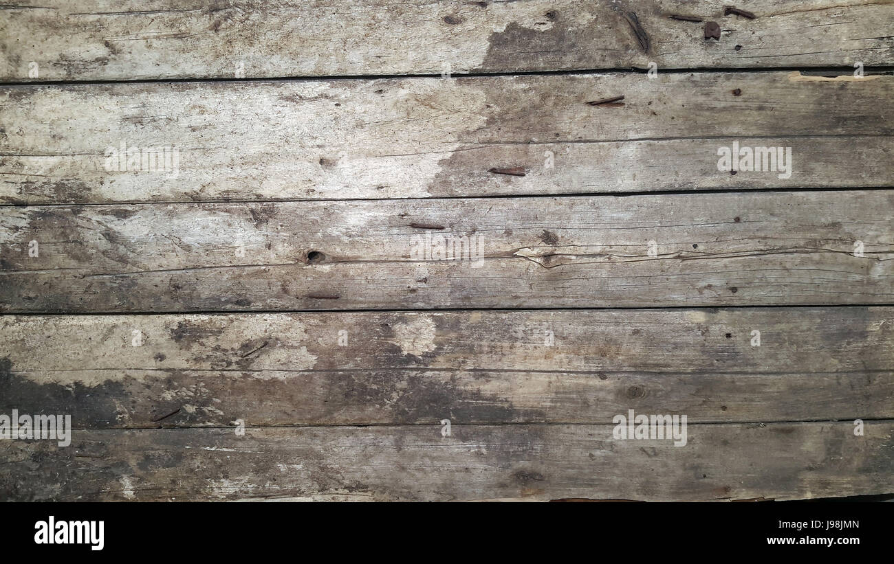Vintage Holz unterzeichnen der alten Bretter mit rostigen Nägeln klopfte Stockfoto